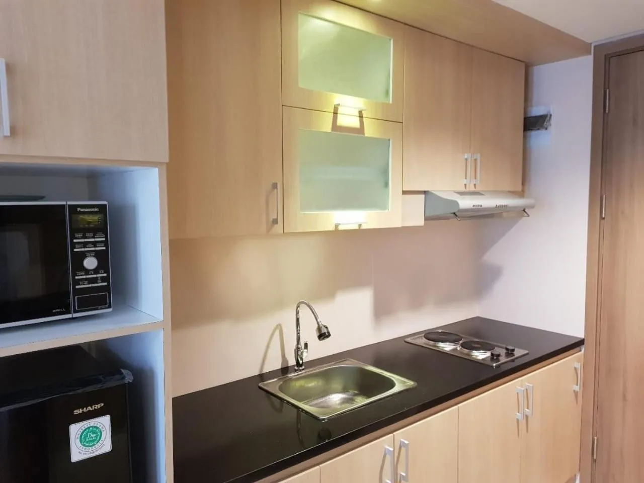 Kitchen or kitchenette in Channel Stay @ Bogor Icon Apartment