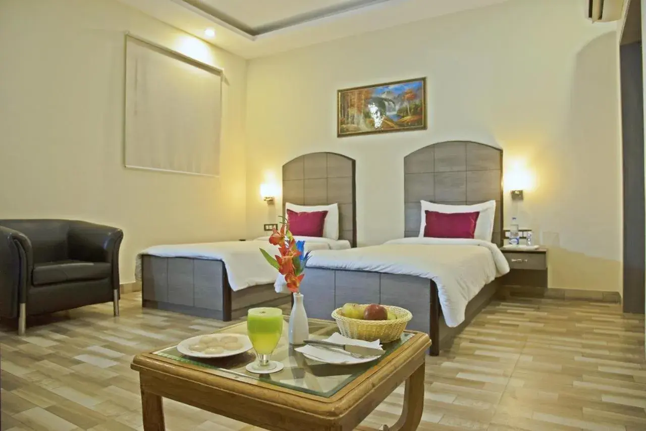 Photo of the whole room, Bed in Spring Sky Mughalsarai By ShriGo Hotels Photo of the whole room, Bed in Spring Sky Mughalsarai By ShriGo Hotels