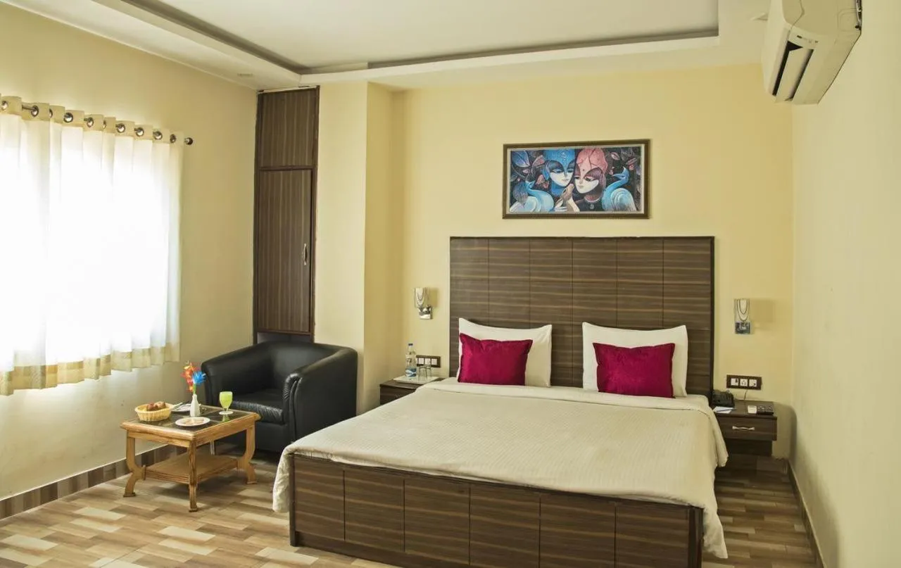 Bed in Spring Sky Mughalsarai By ShriGo Hotels