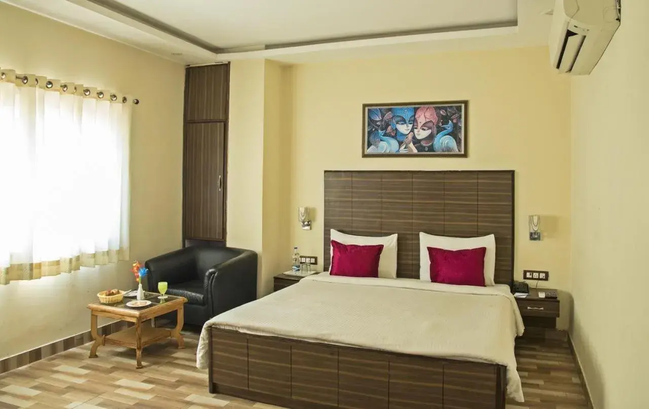Bed in Spring Sky Mughalsarai By ShriGo Hotels Bed in Spring Sky Mughalsarai By ShriGo Hotels