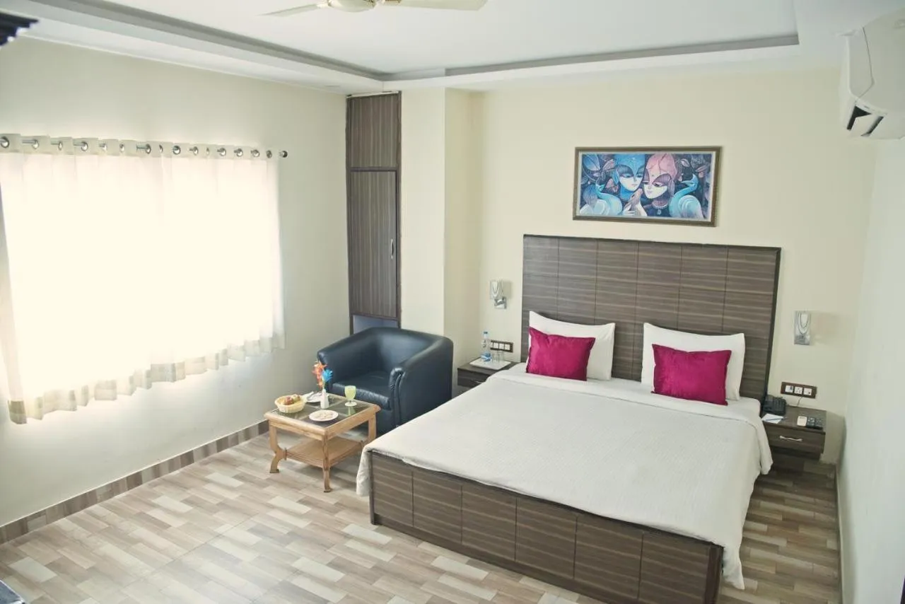 Bed in Spring Sky Mughalsarai By ShriGo Hotels