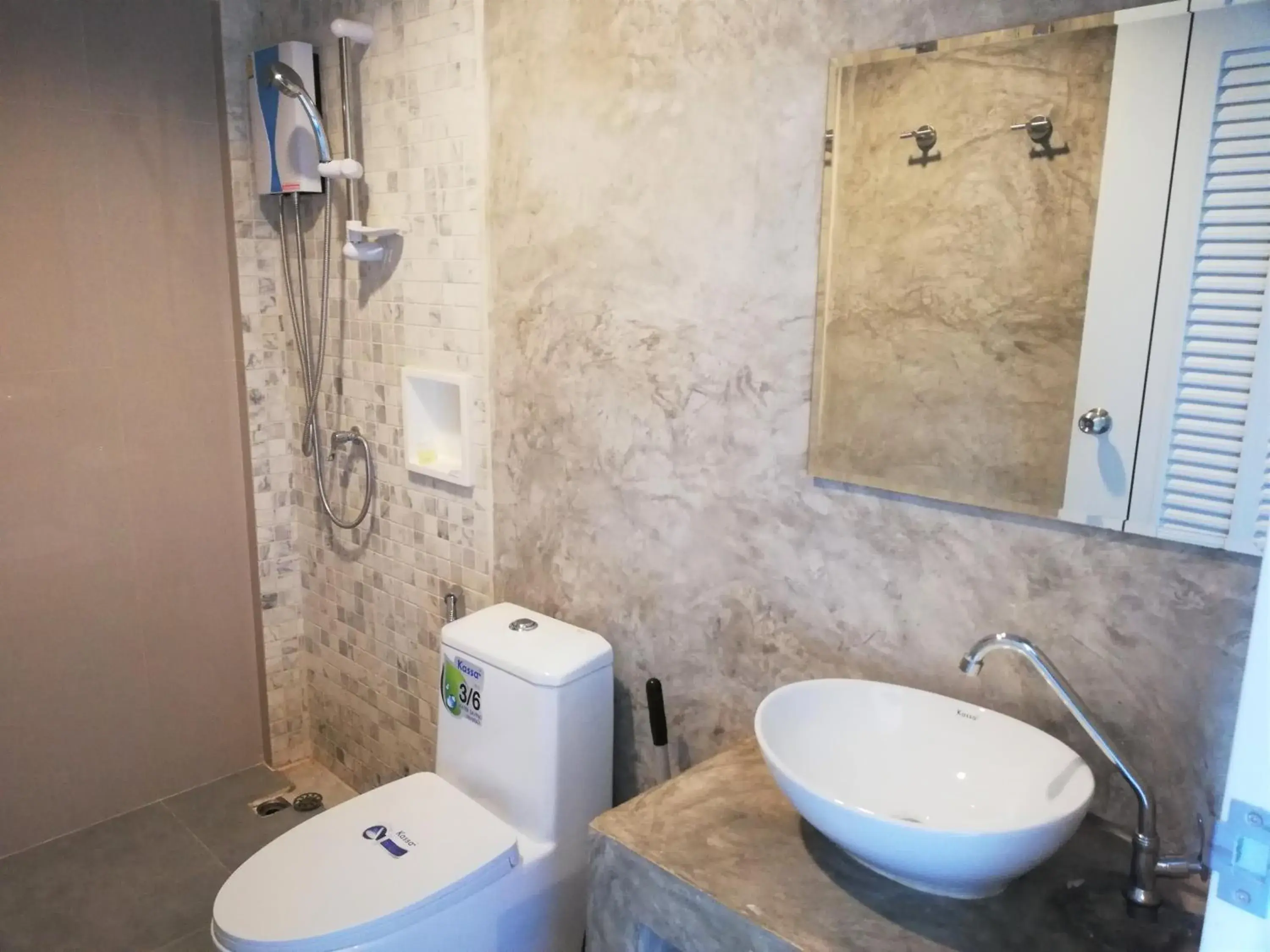 Bathroom in Laemsai Resort Bathroom in Laemsai Resort