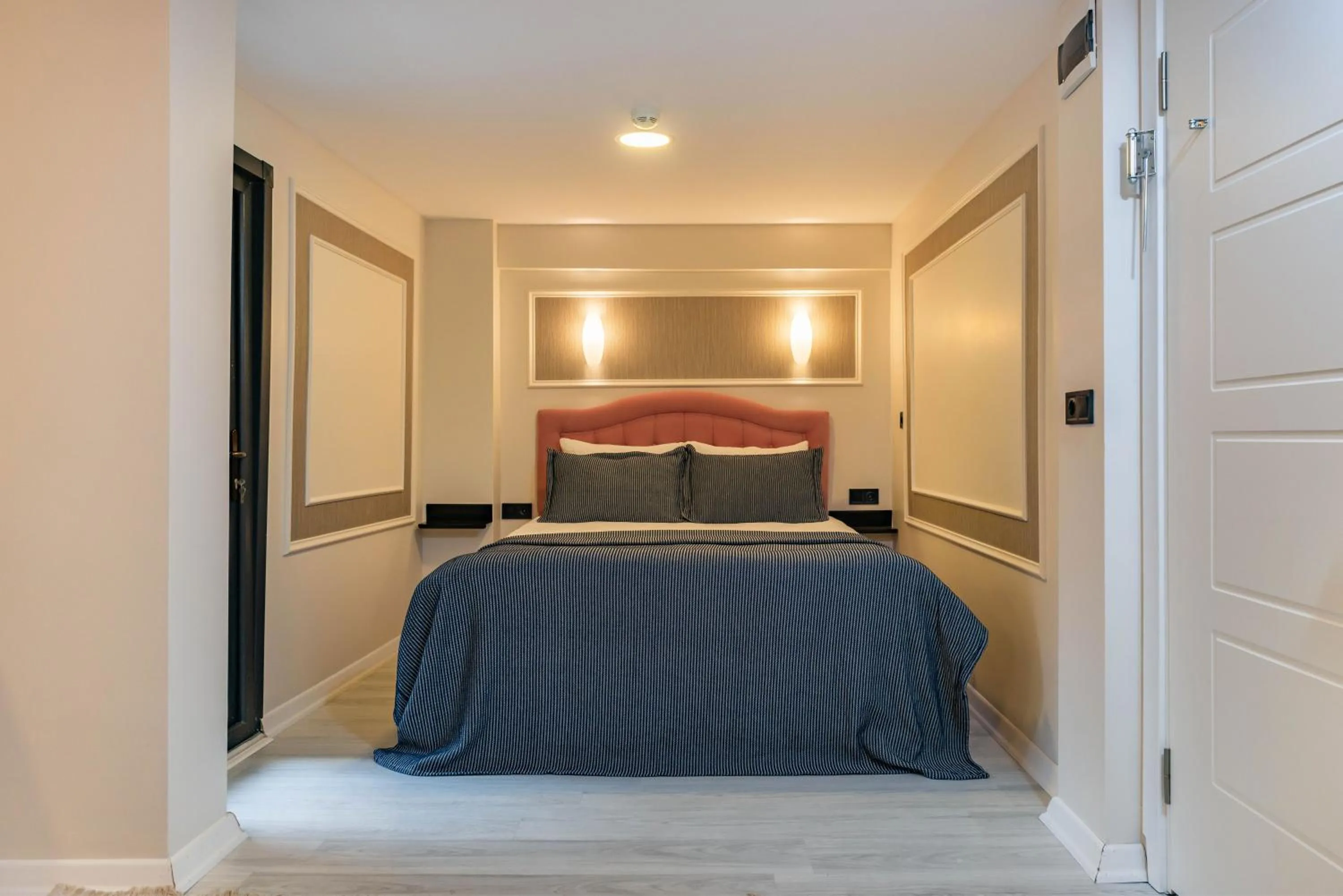 Bed in BLUE MARMARA SUITES