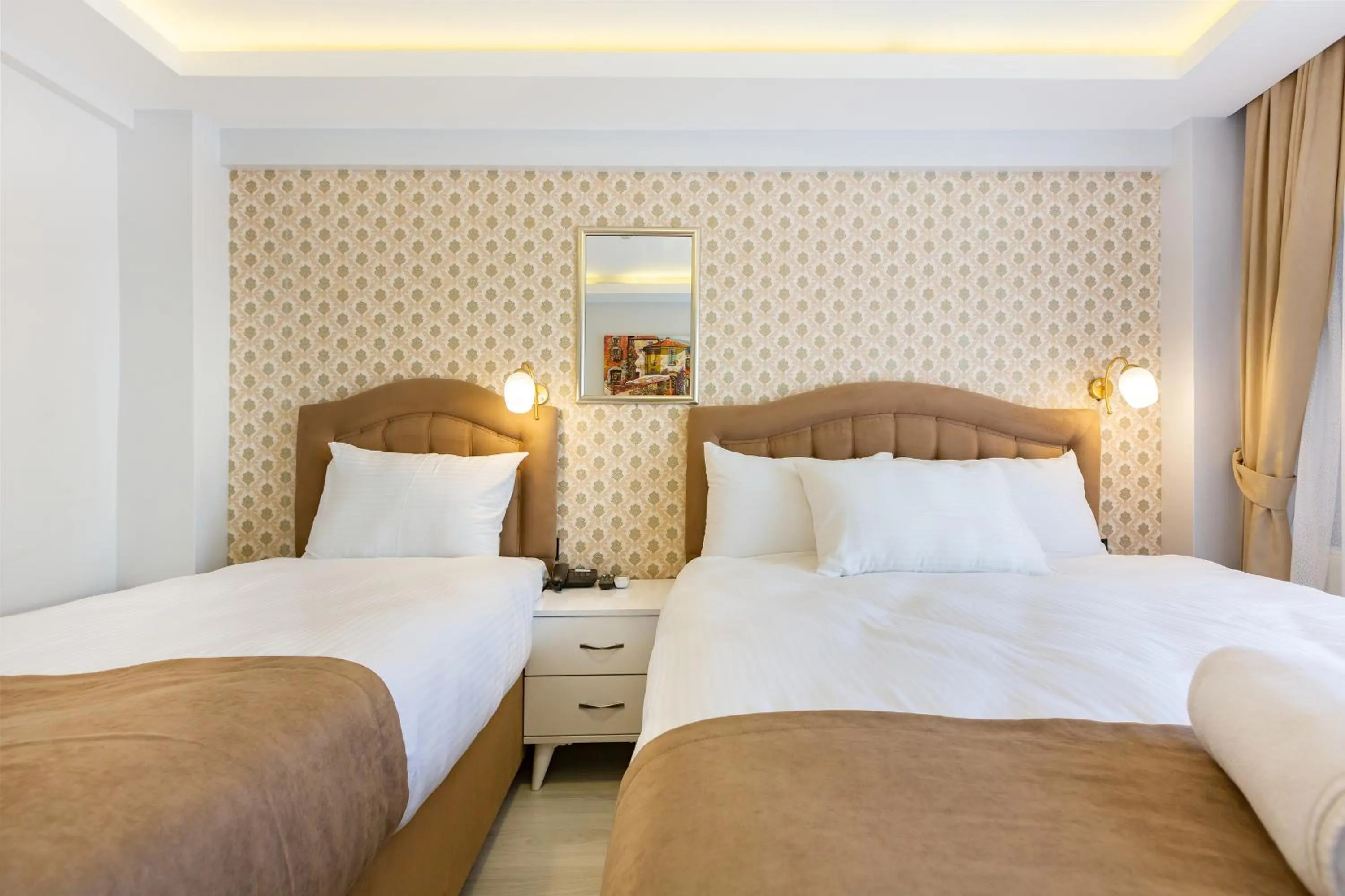 Bed in BLUE MARMARA SUITES