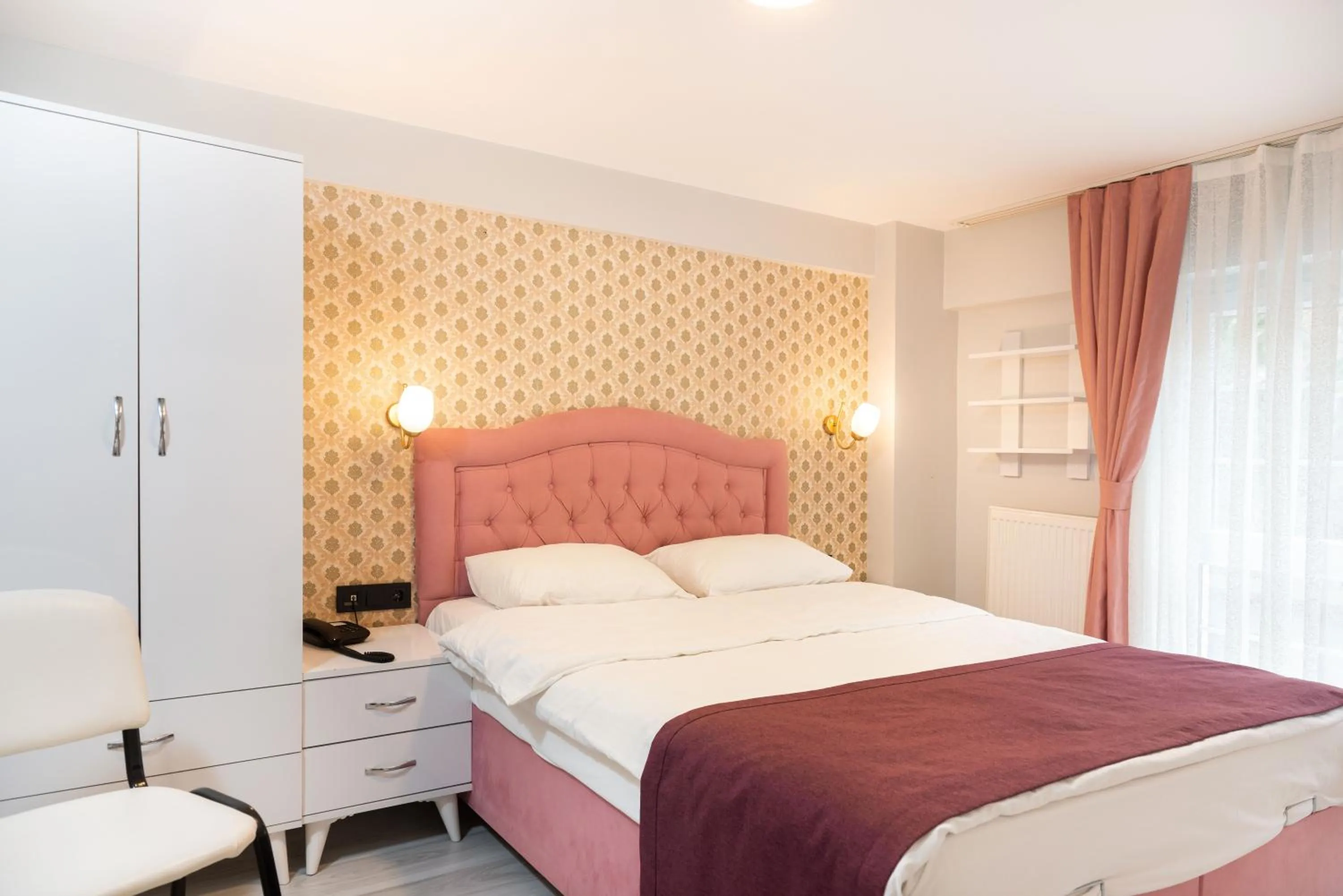 Bed in BLUE MARMARA SUITES