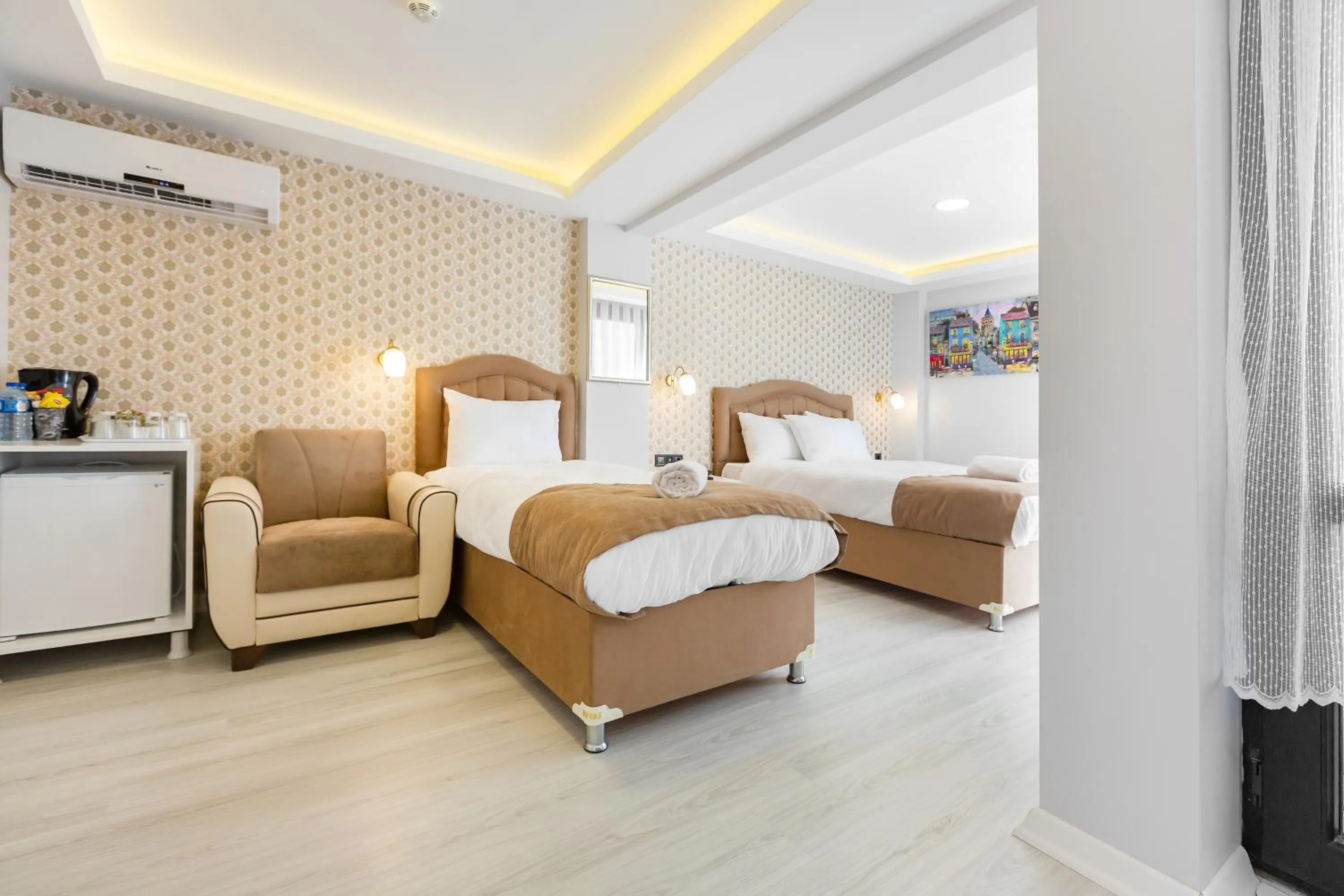 Bed in BLUE MARMARA SUITES