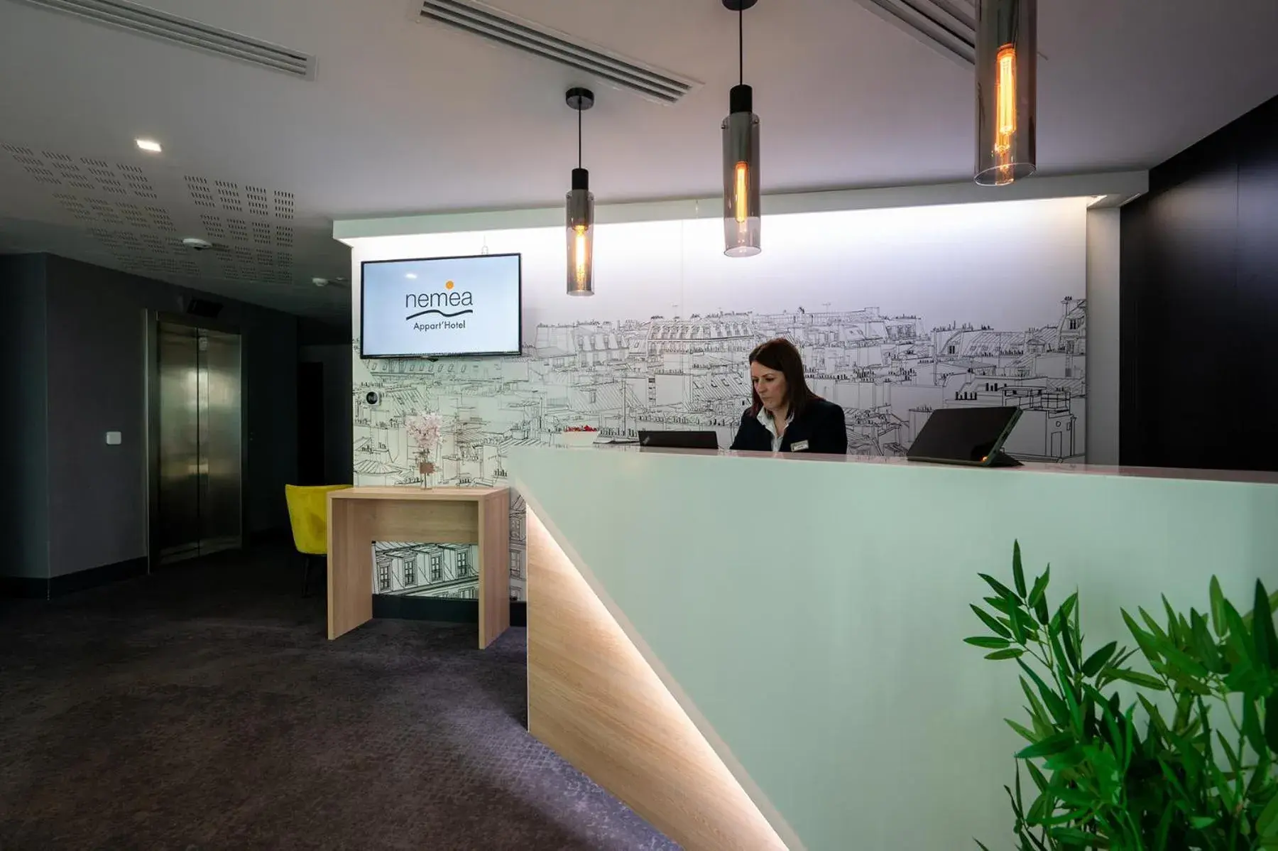 Lobby or reception in Nemea Appart Hotel Paris Levallois Lobby or reception in Nemea Appart Hotel Paris Levallois