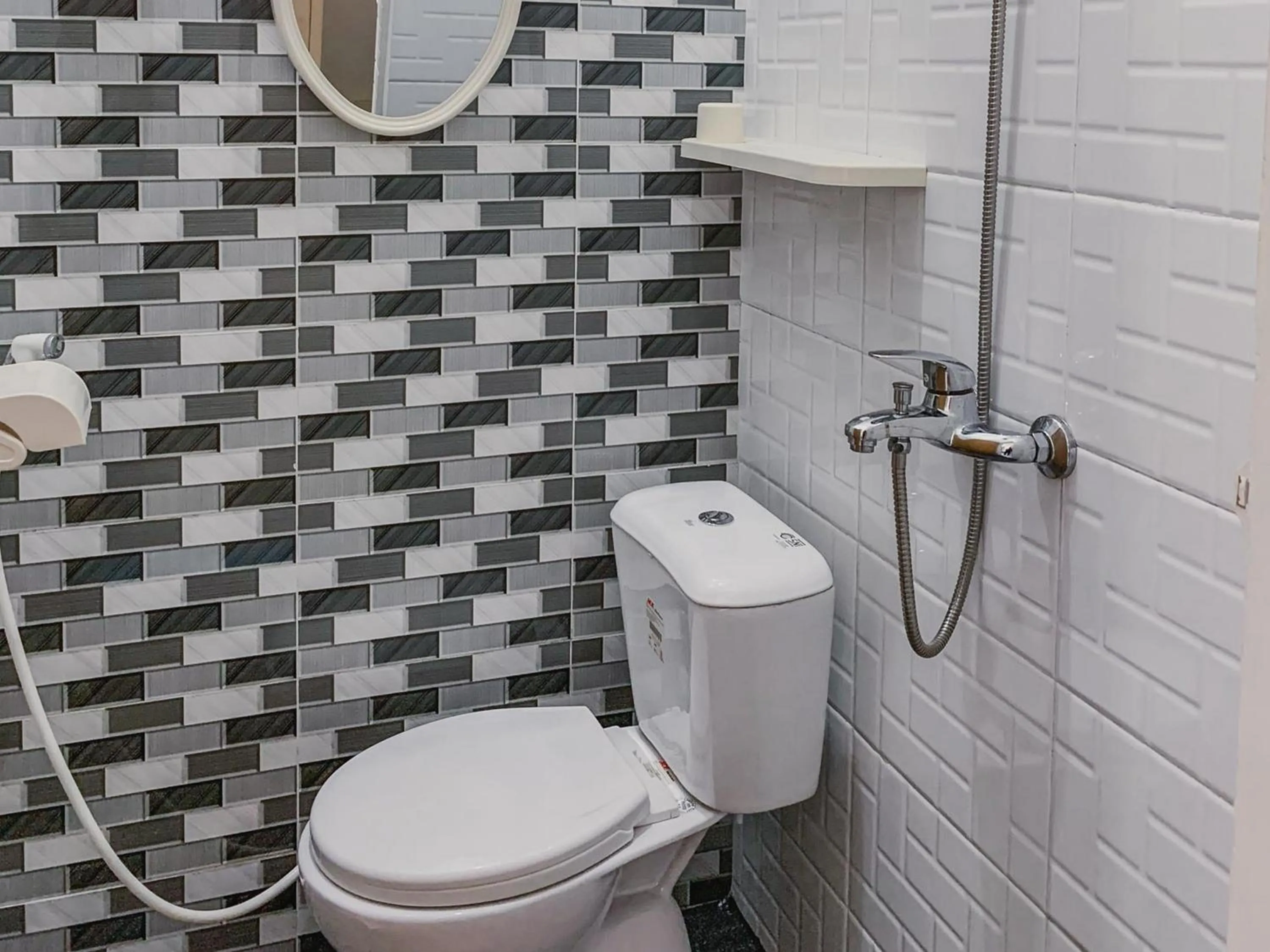 Bathroom in RedDoorz Syariah near Universitas Syiah Kuala Aceh