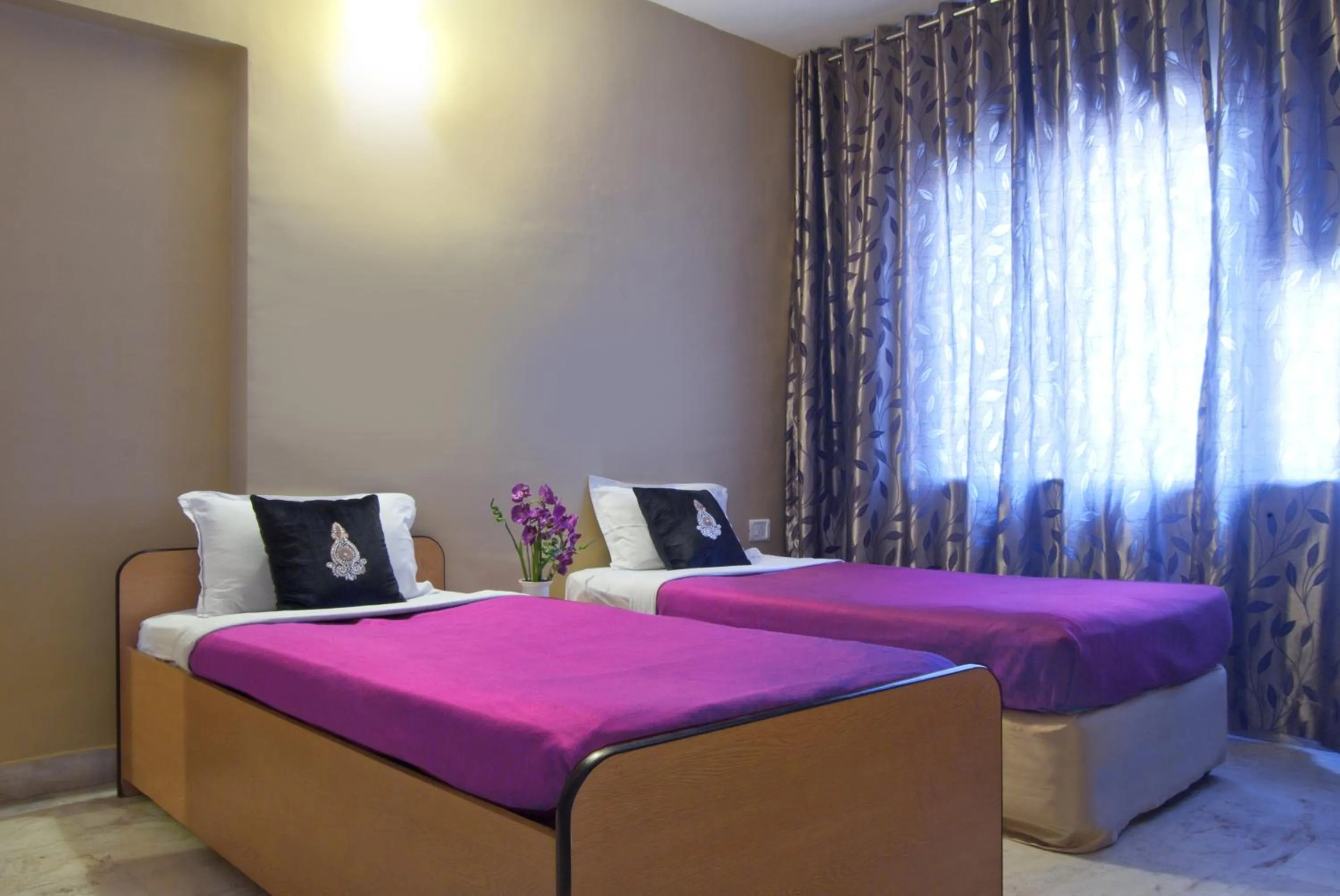 Bed in Landmark Asia Serviced Apartments