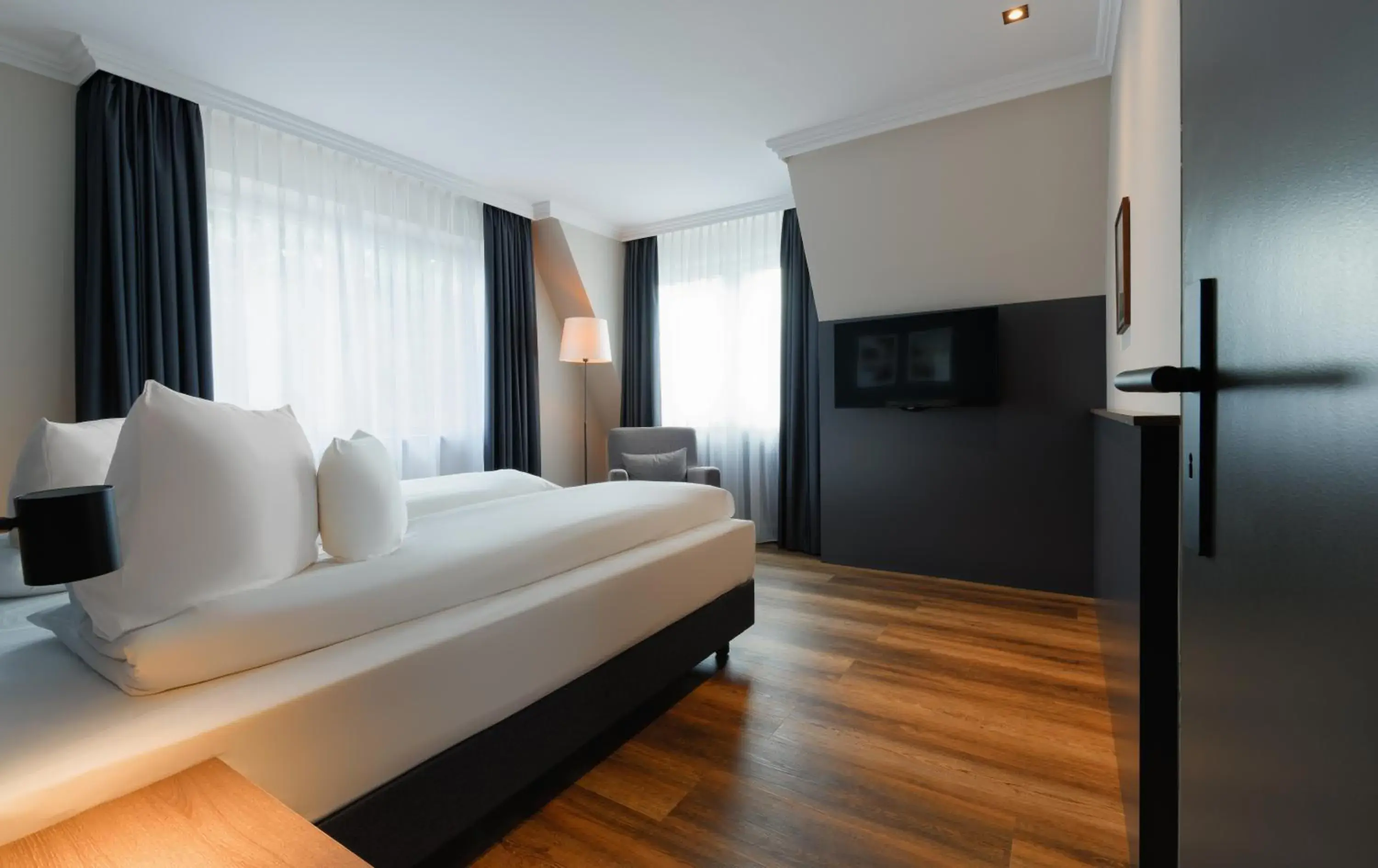 Bed in ATLANTIC Hotel Landgut Horn Bed in ATLANTIC Hotel Landgut Horn