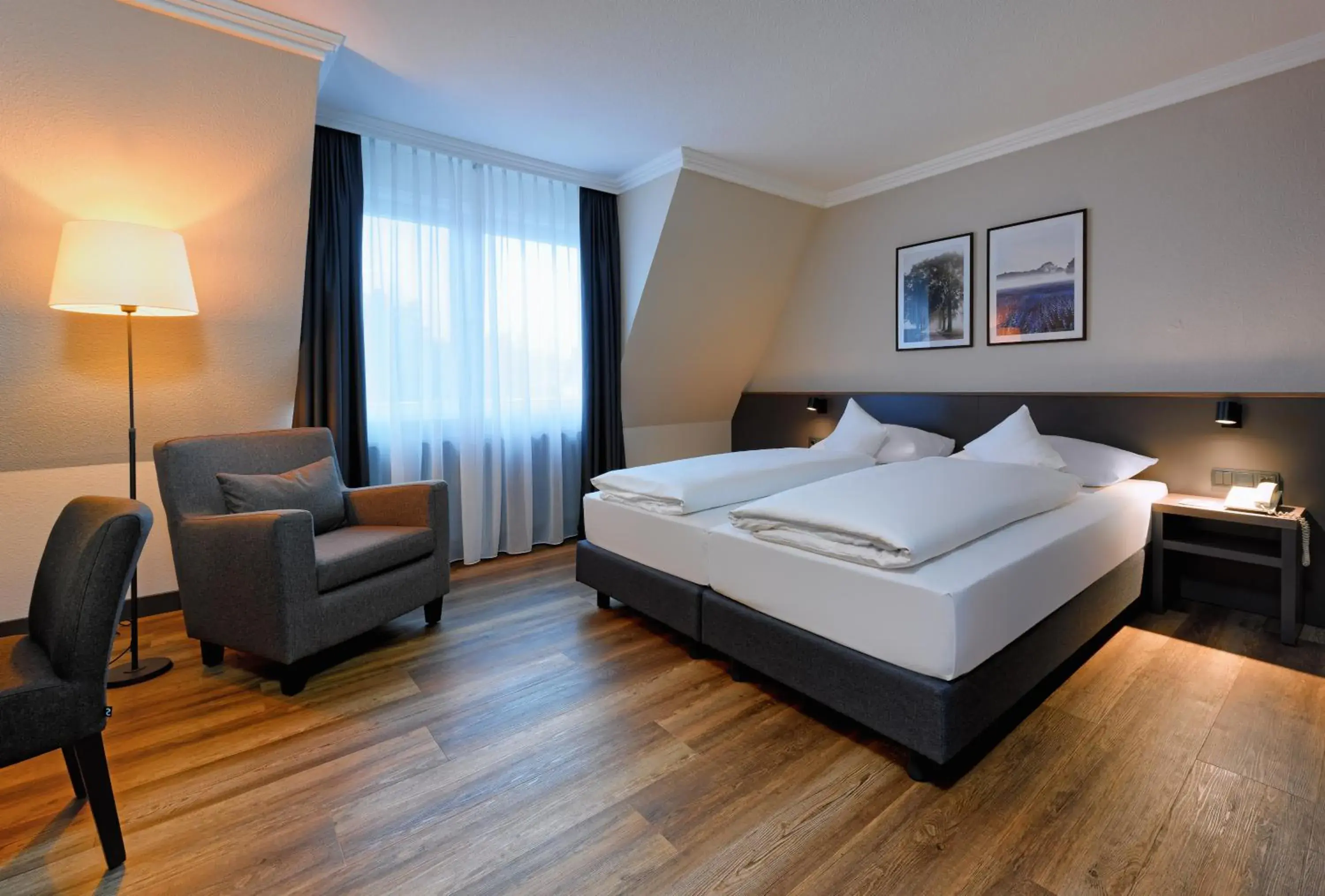 Photo of the whole room, Bed in ATLANTIC Hotel Landgut Horn Photo of the whole room, Bed in ATLANTIC Hotel Landgut Horn