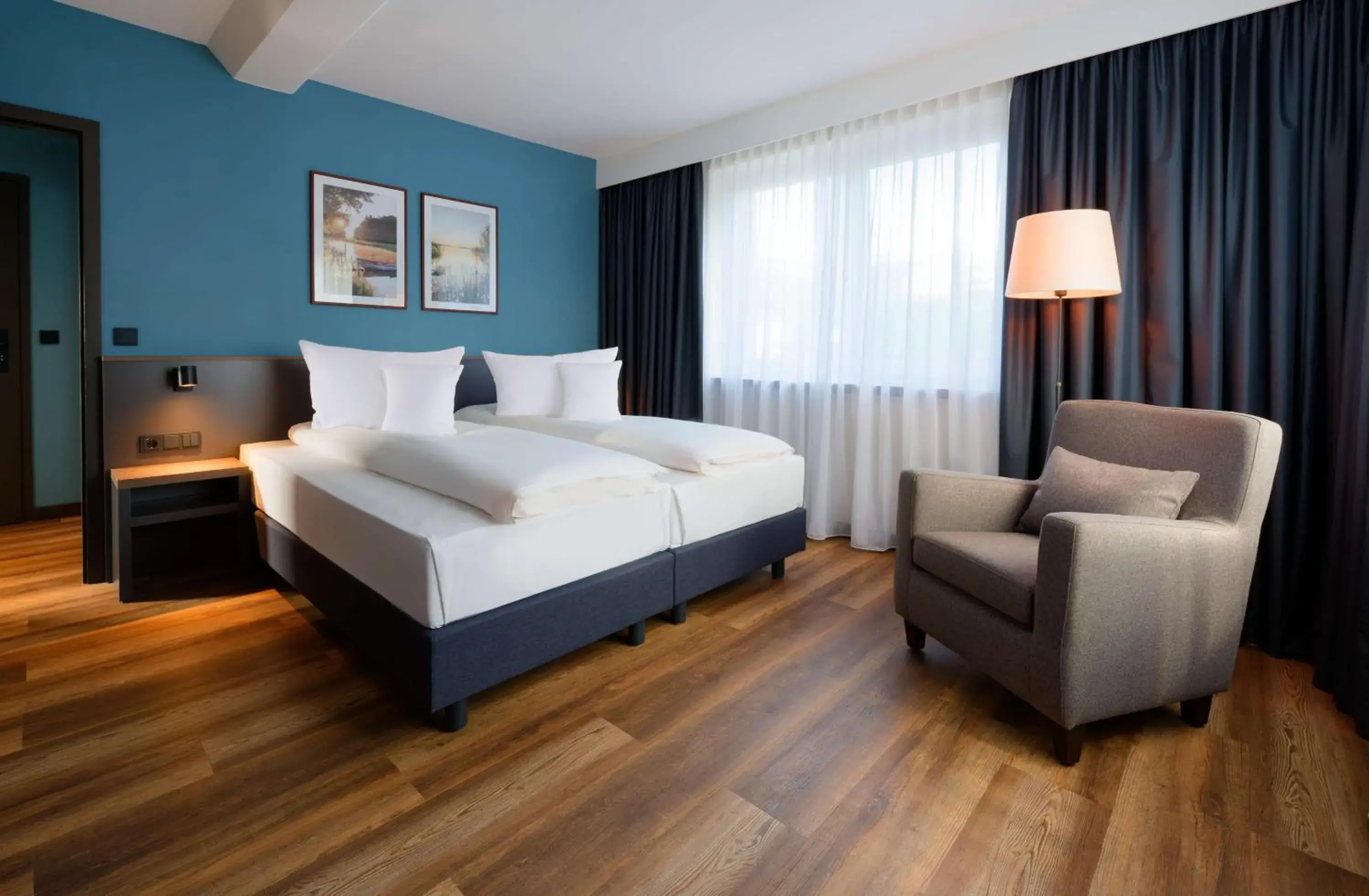 Photo of the whole room, Bed in ATLANTIC Hotel Landgut Horn Photo of the whole room, Bed in ATLANTIC Hotel Landgut Horn