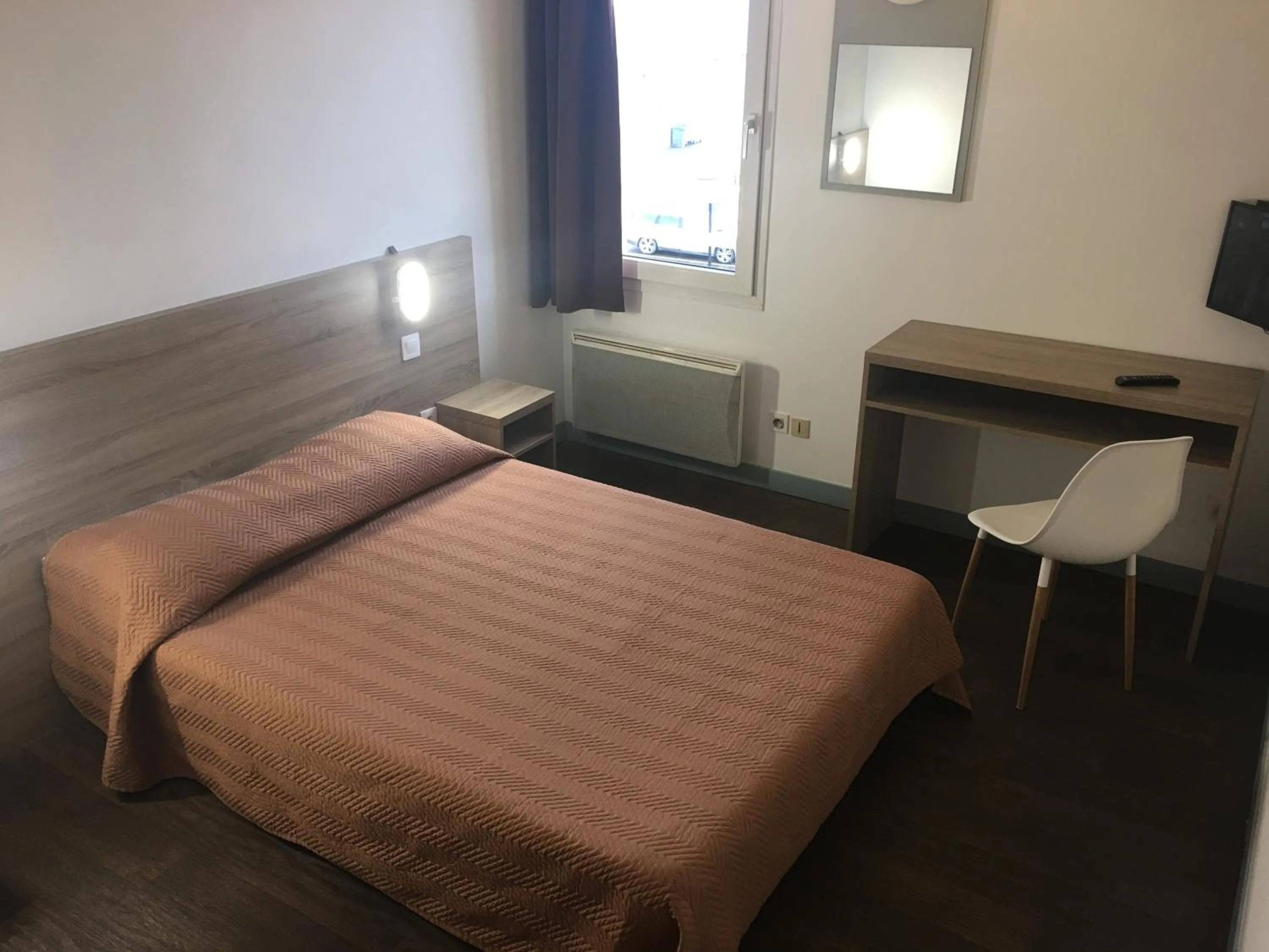 Bed in Hôtel Motelia