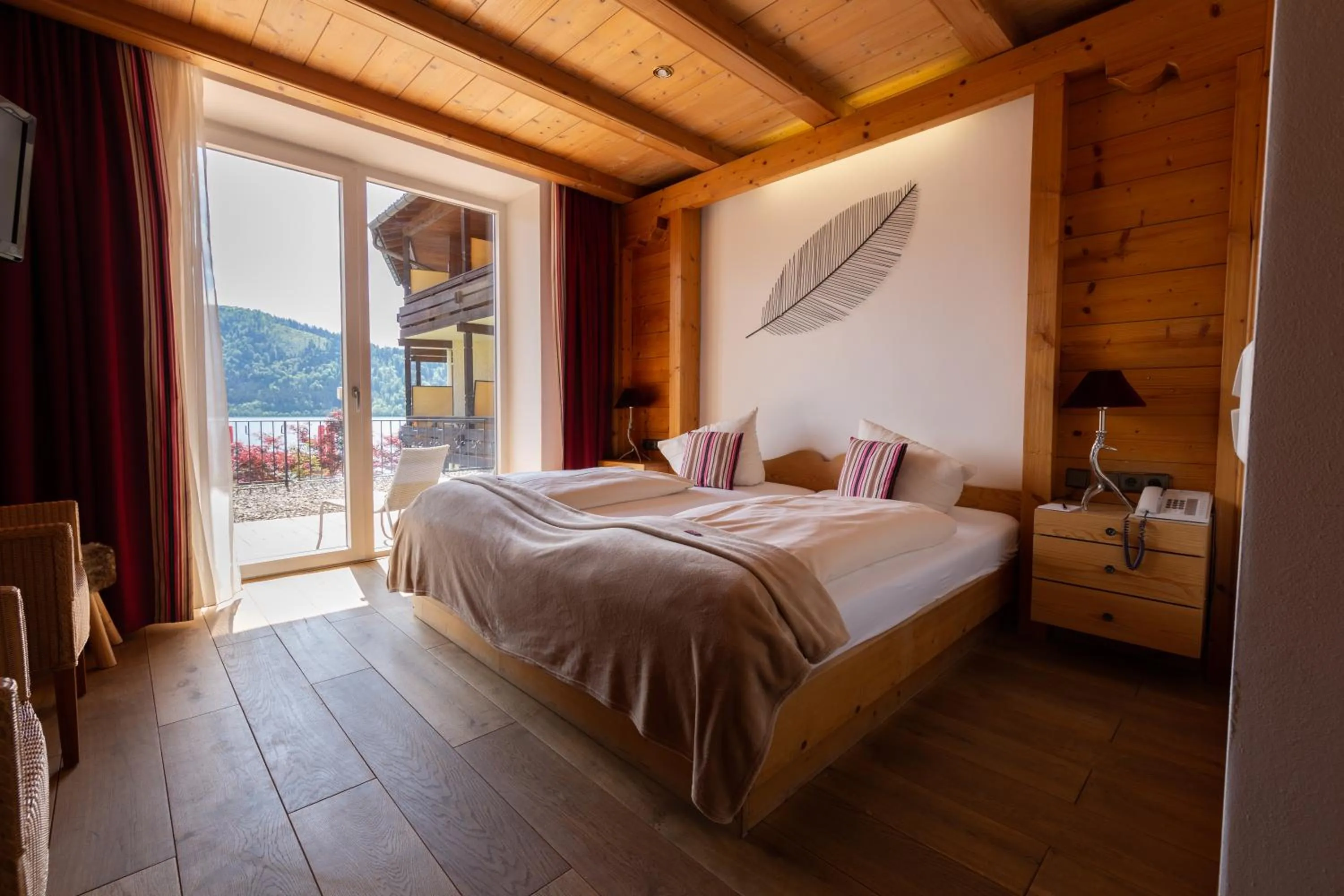 Photo of the whole room, Bed in Seehotel Schlierseer Hof