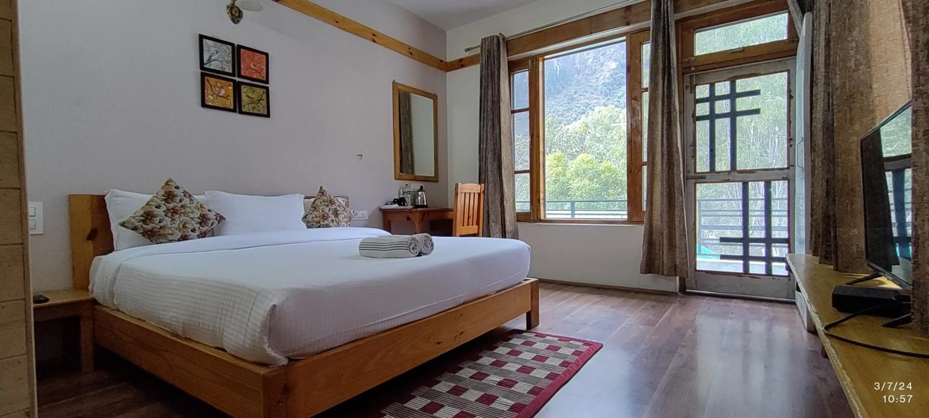 Bed in Tirthan Grand Riverside