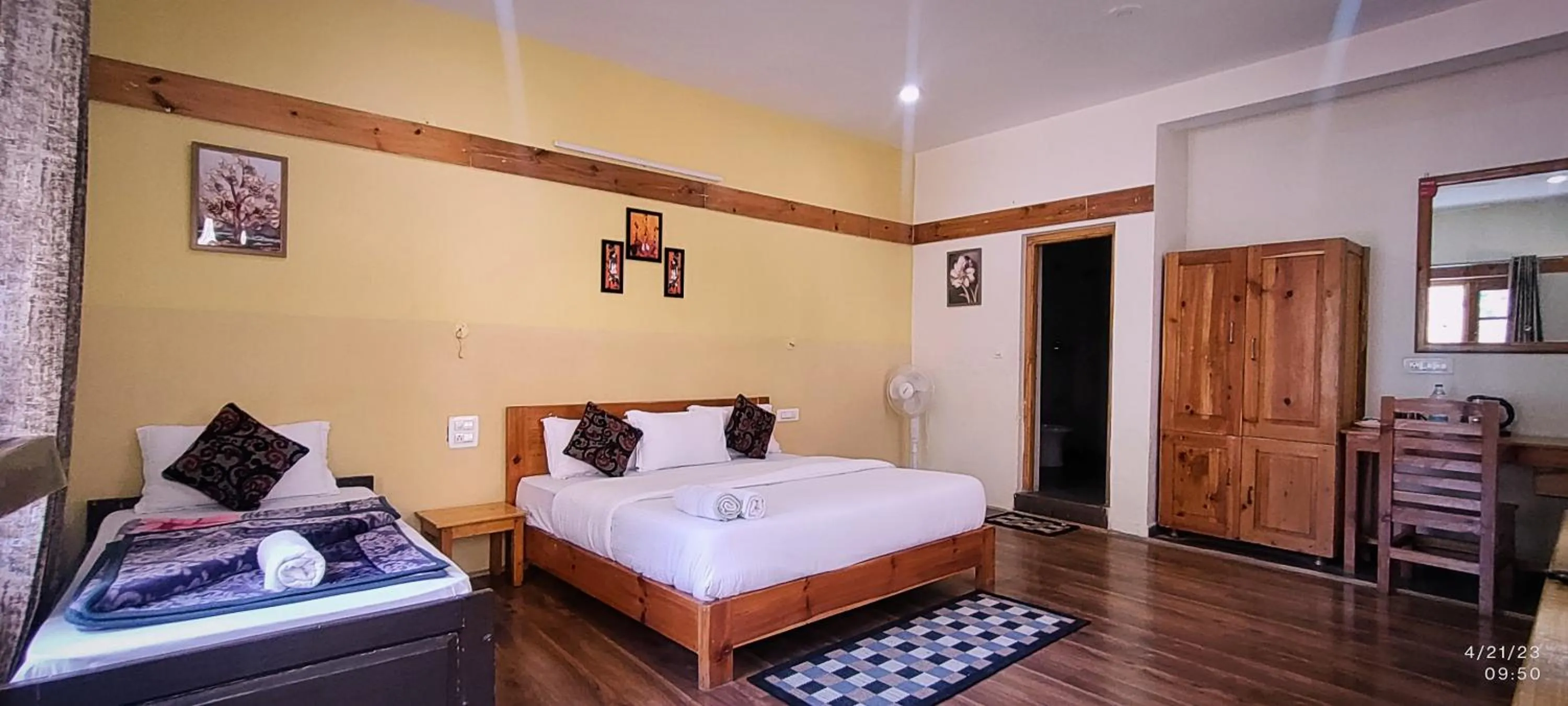 Bed in Tirthan Grand Riverside