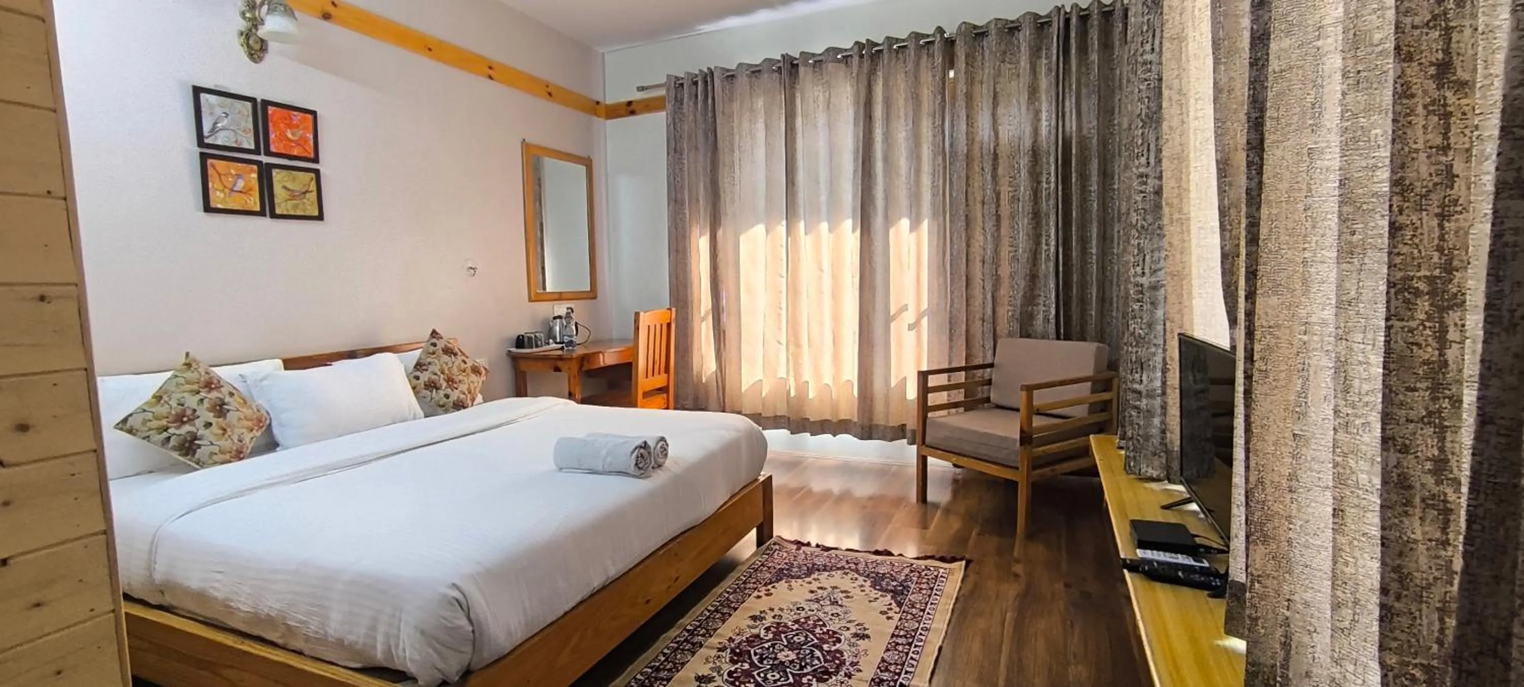 Bed in Tirthan Grand Riverside