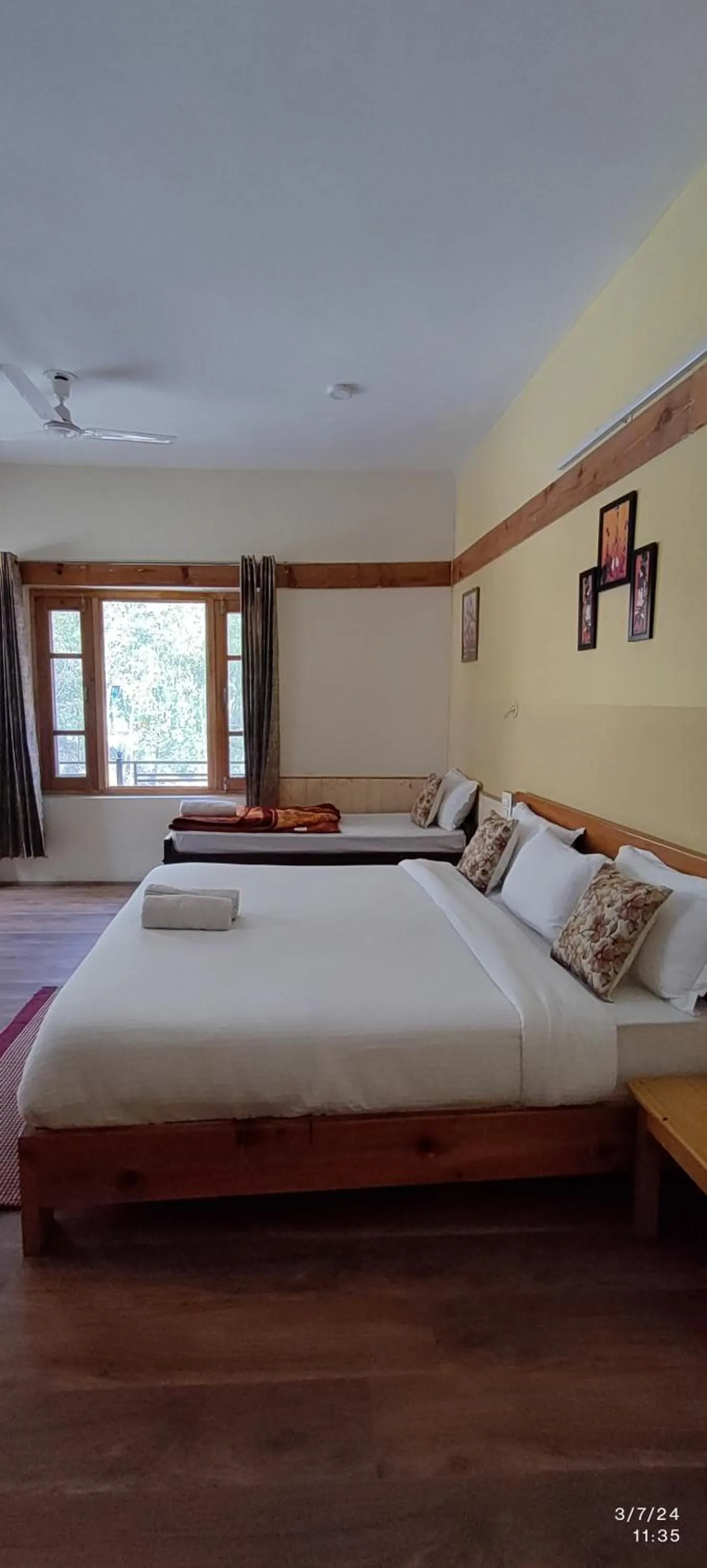 Bed in Tirthan Grand Riverside