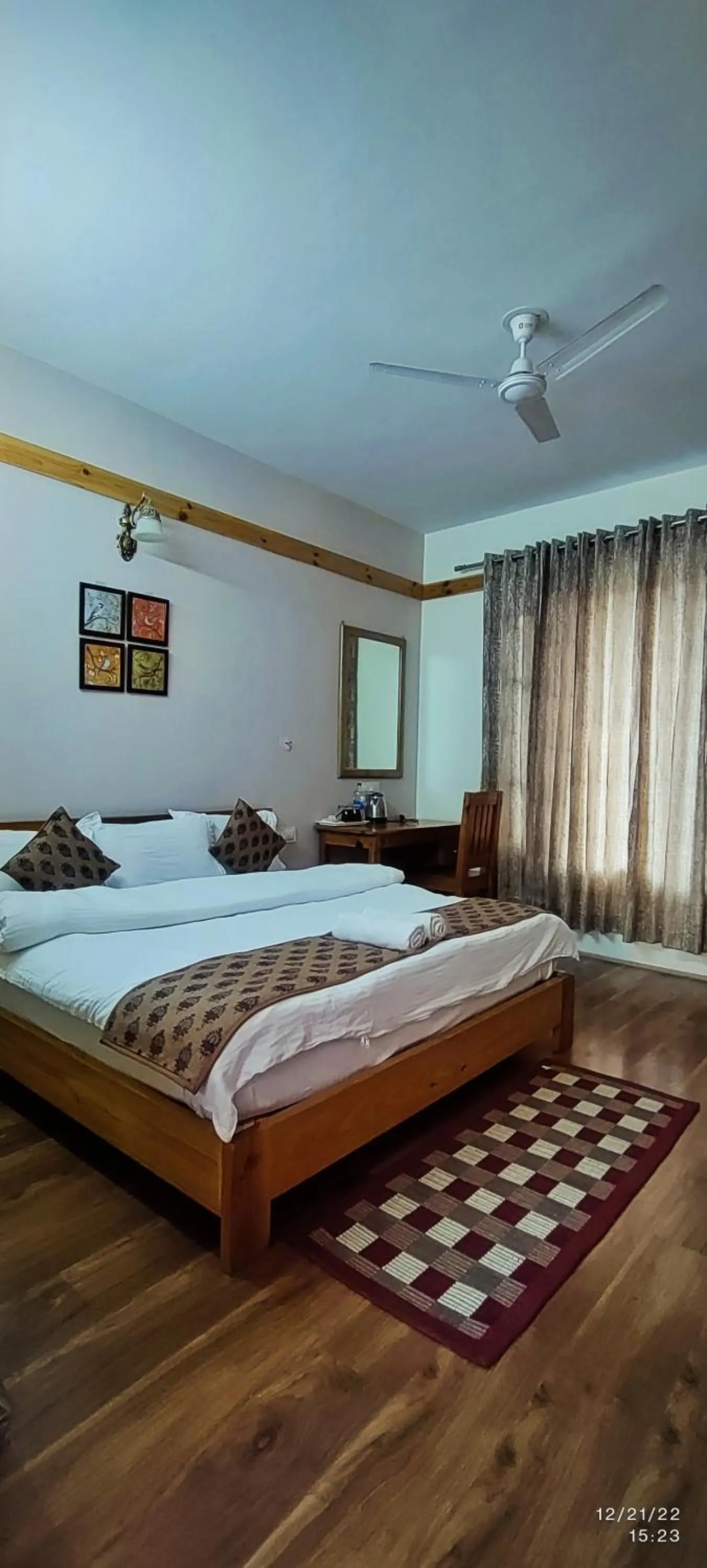 Bed in Tirthan Grand Riverside