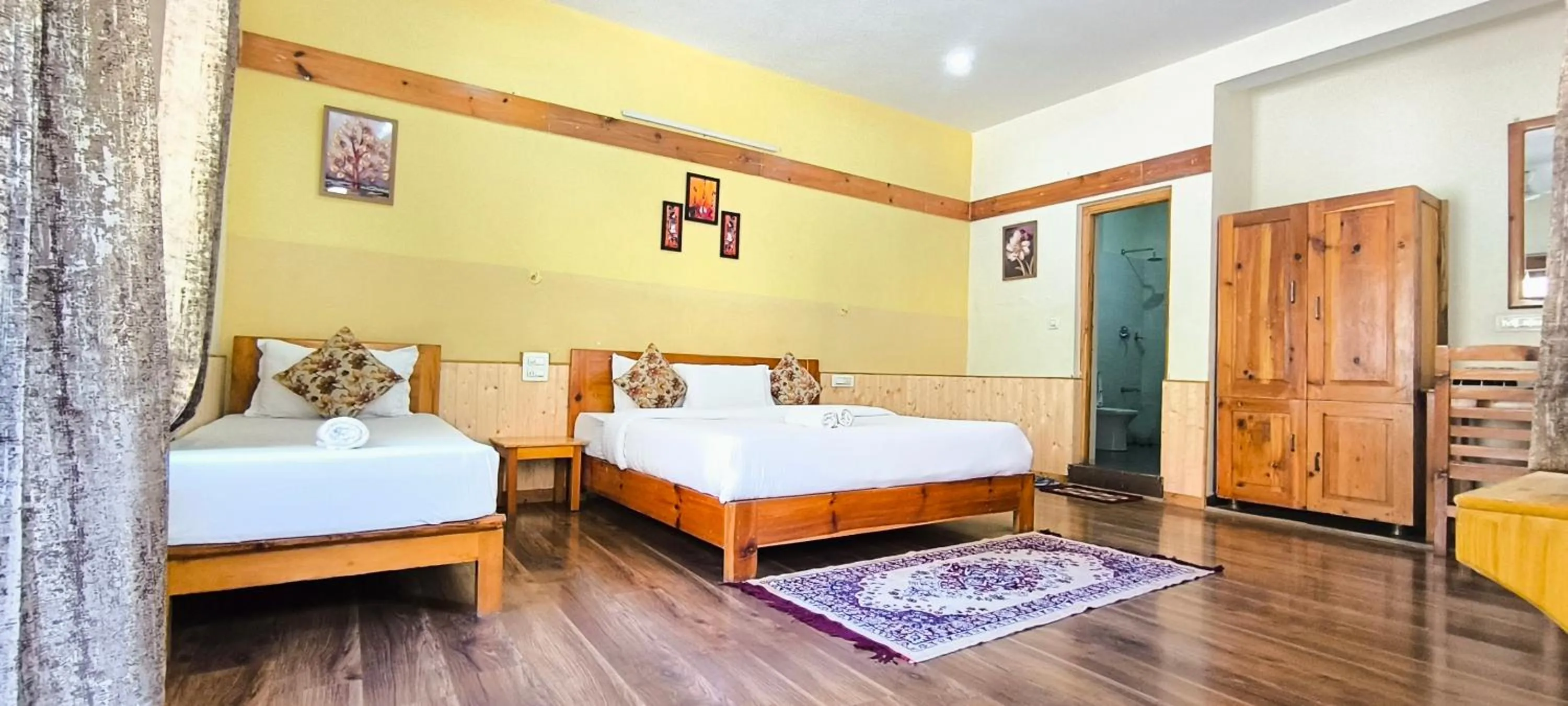 Bed in Tirthan Grand Riverside