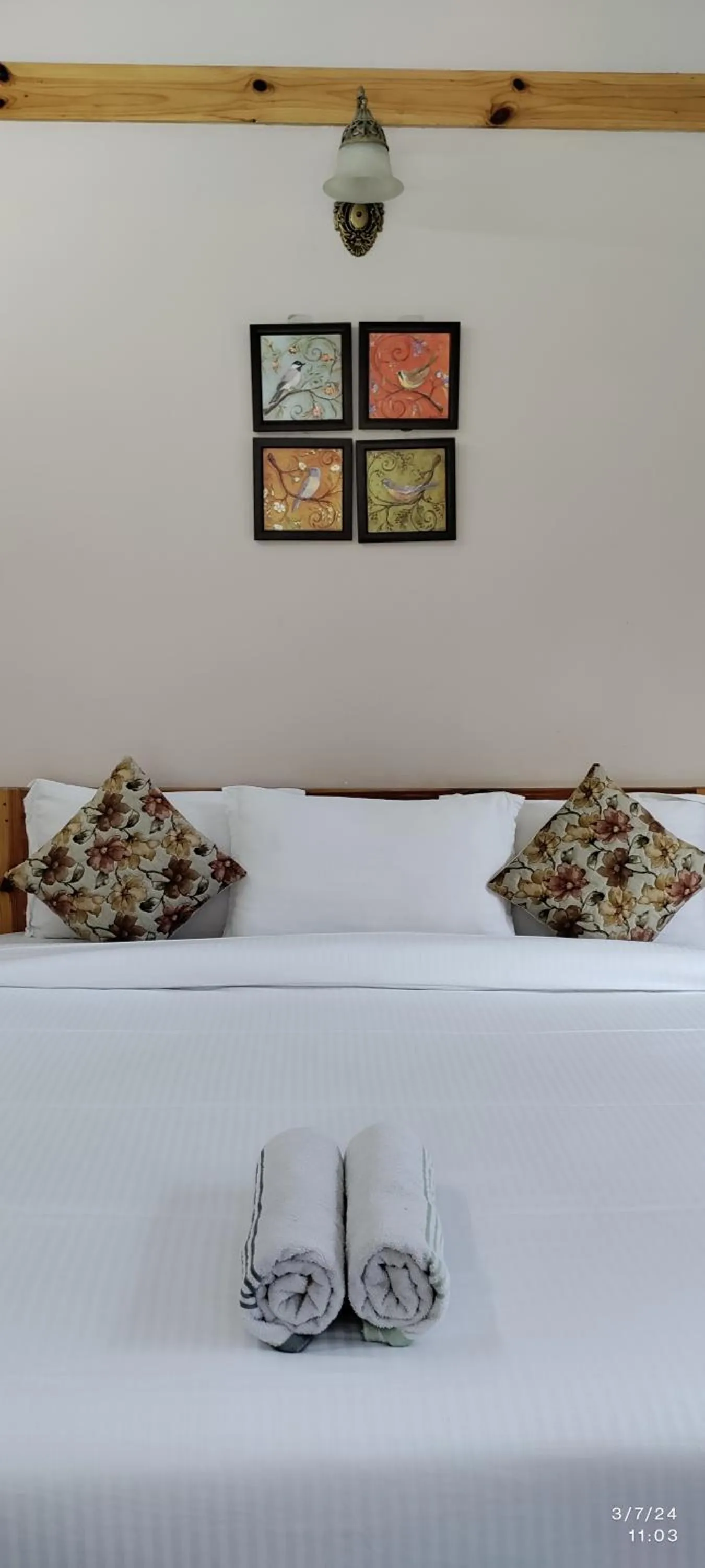 Bed in Tirthan Grand Riverside