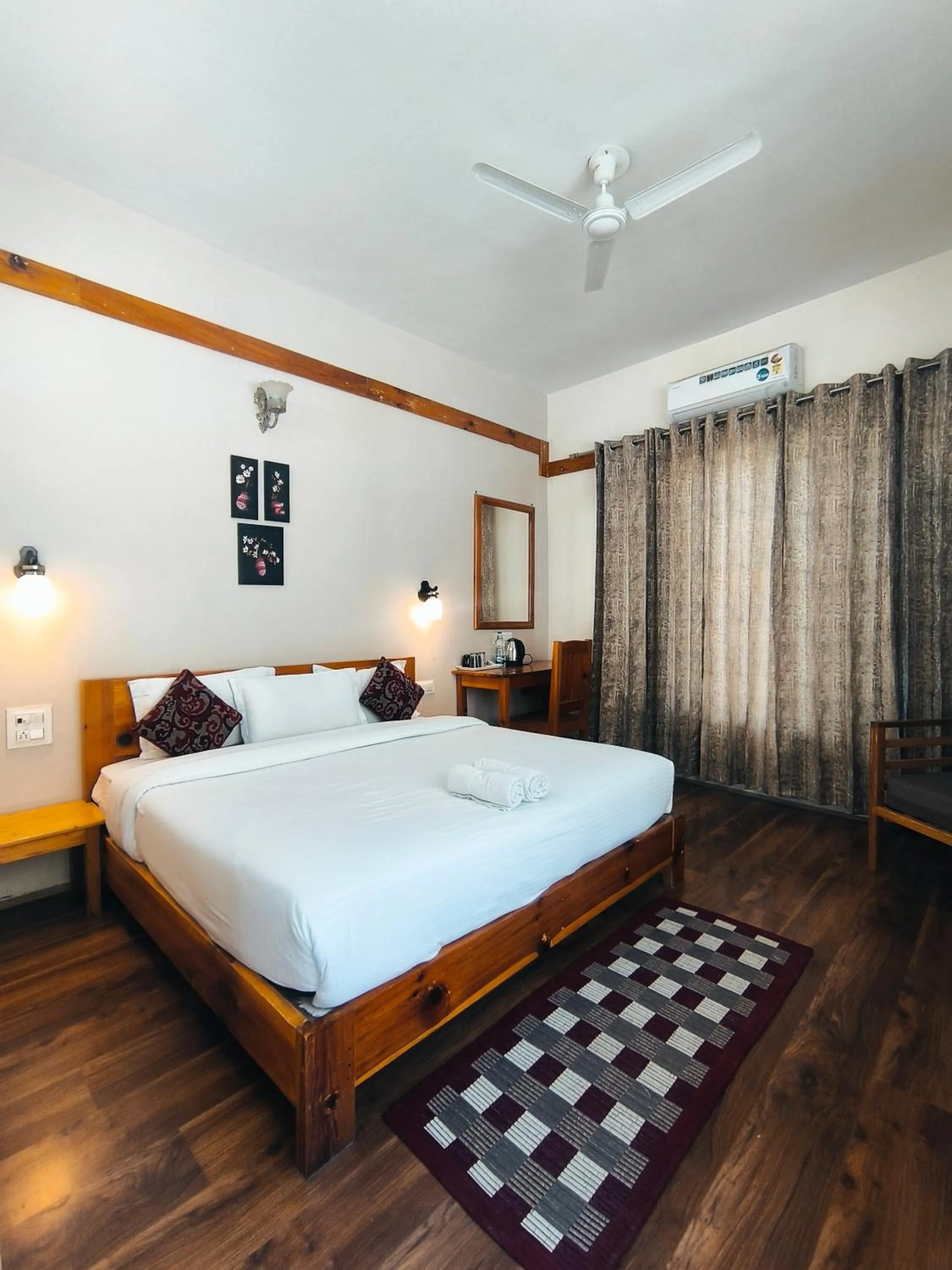 Bed in Tirthan Grand Riverside