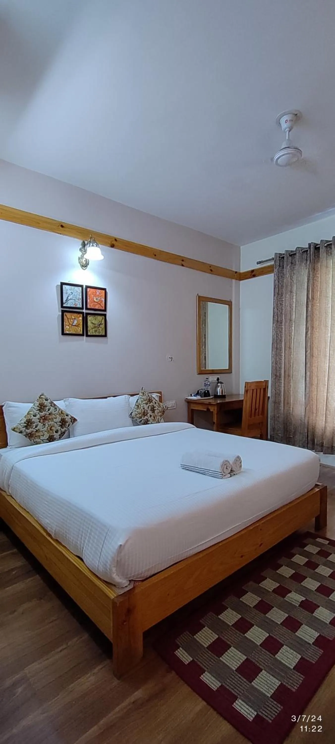 Bed in Tirthan Grand Riverside