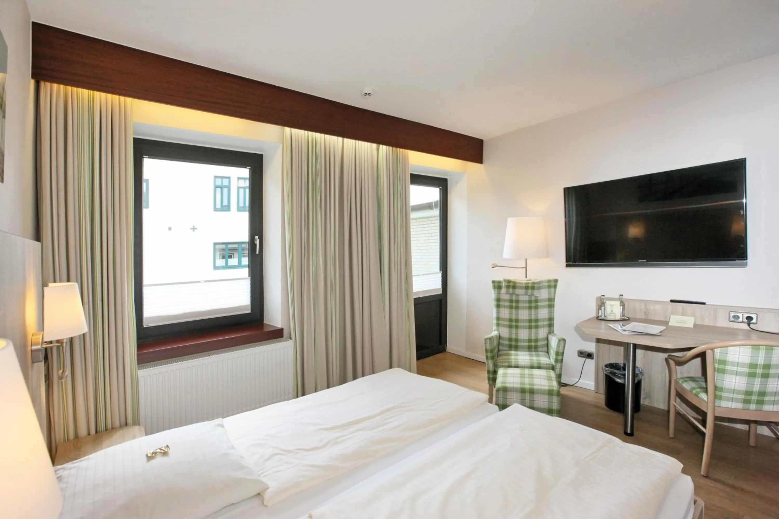 Bed in Hotel Kirchspiels Gasthaus