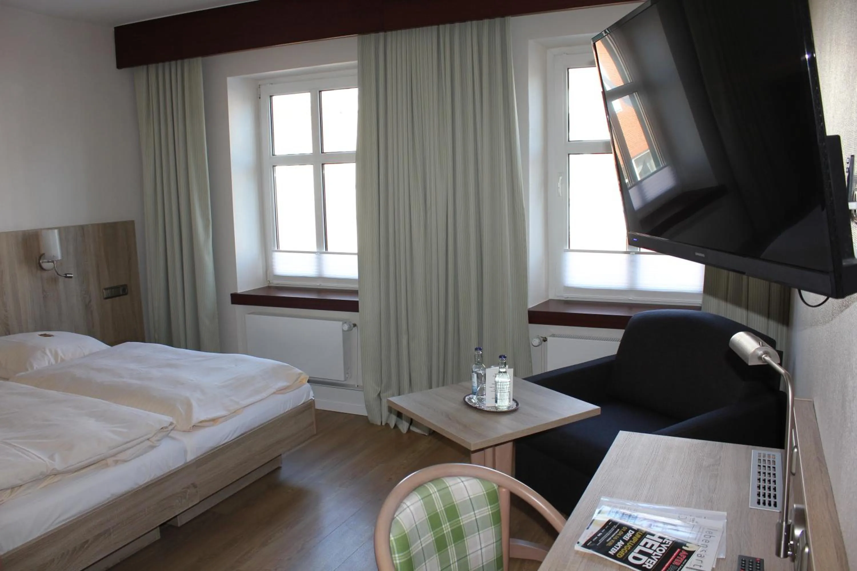 Photo of the whole room, Bed in Hotel Kirchspiels Gasthaus