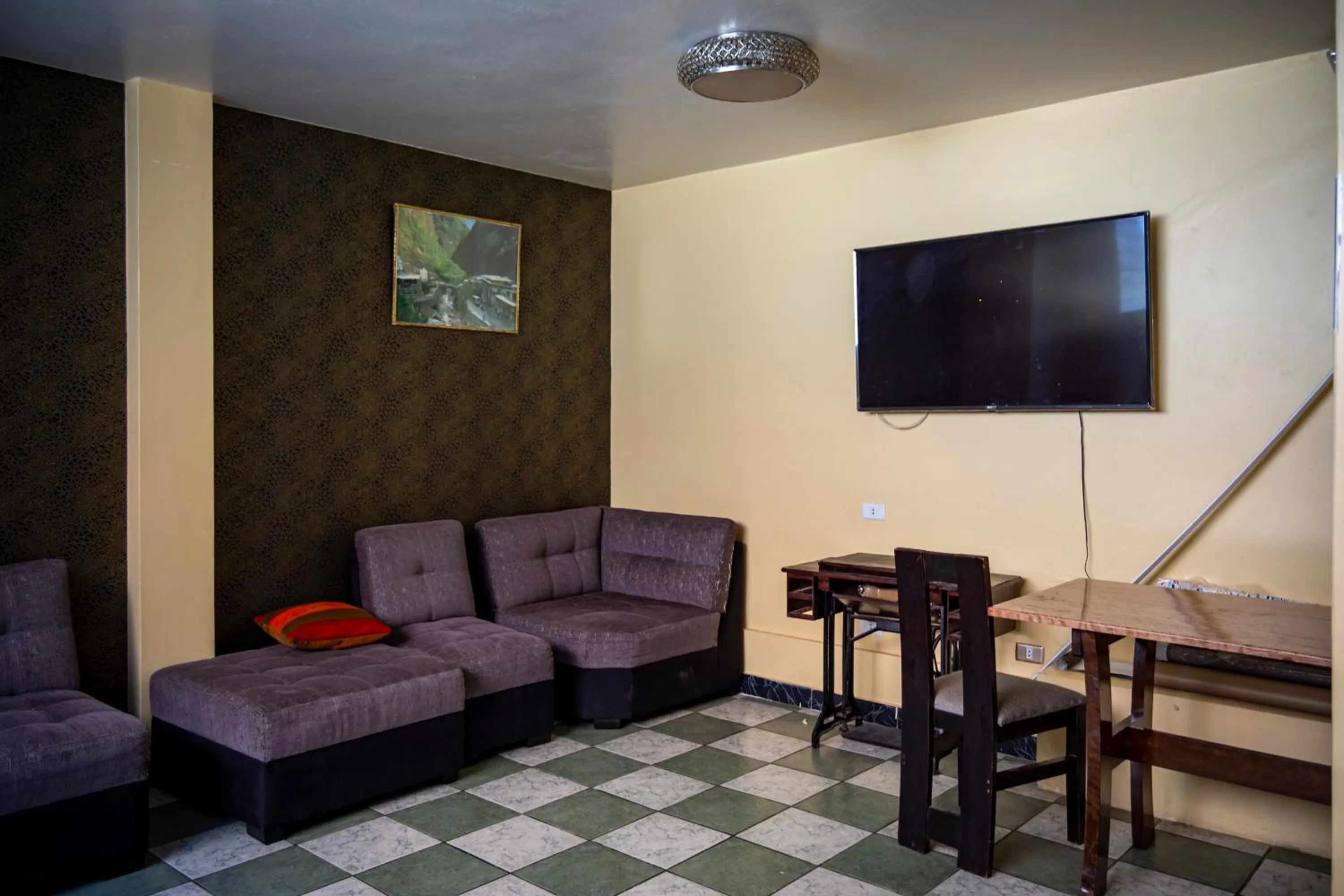 Communal lounge/ TV room in Don Feli House
