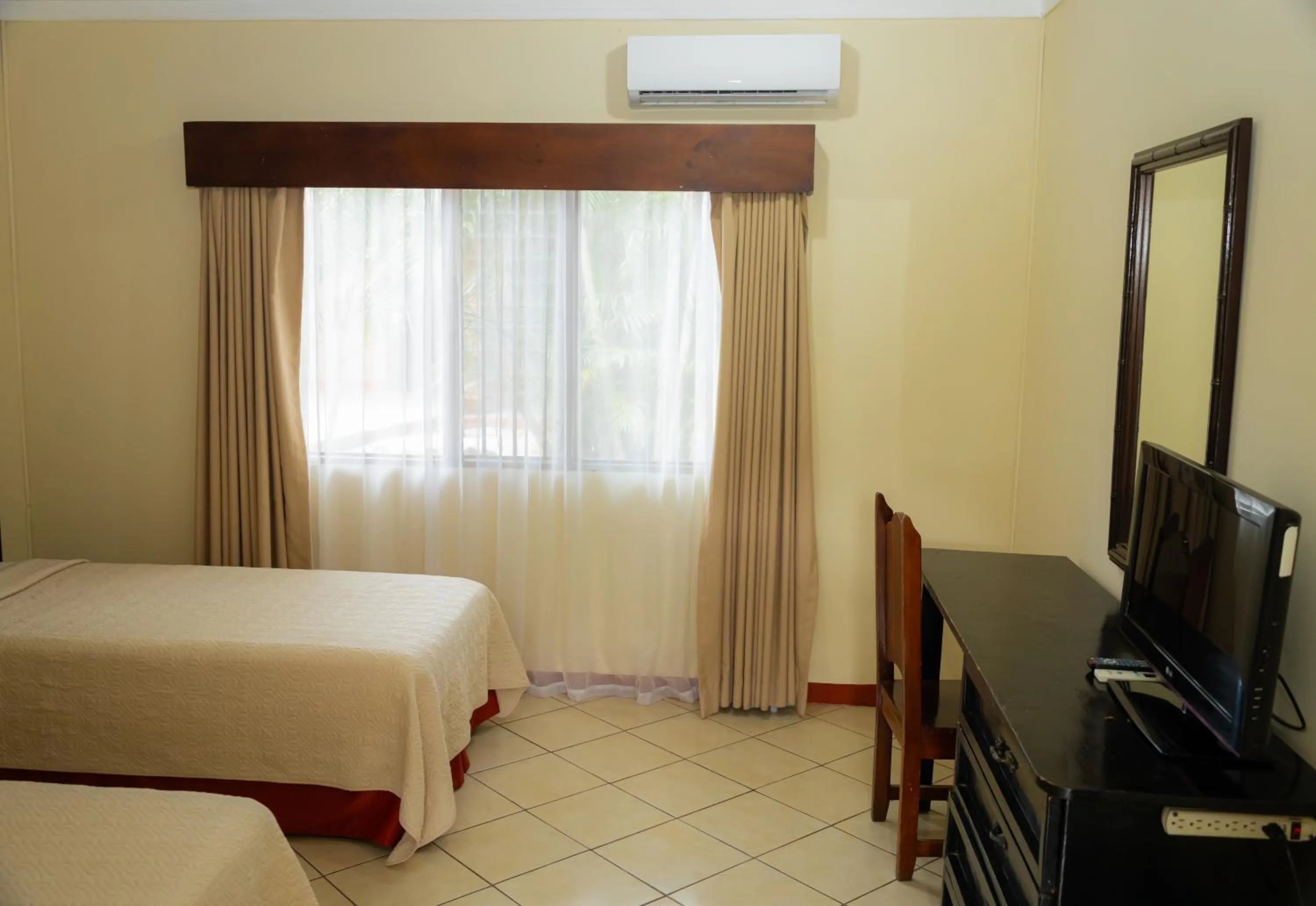 Bed in Hotel Las Espuelas, Bar & Restaurant