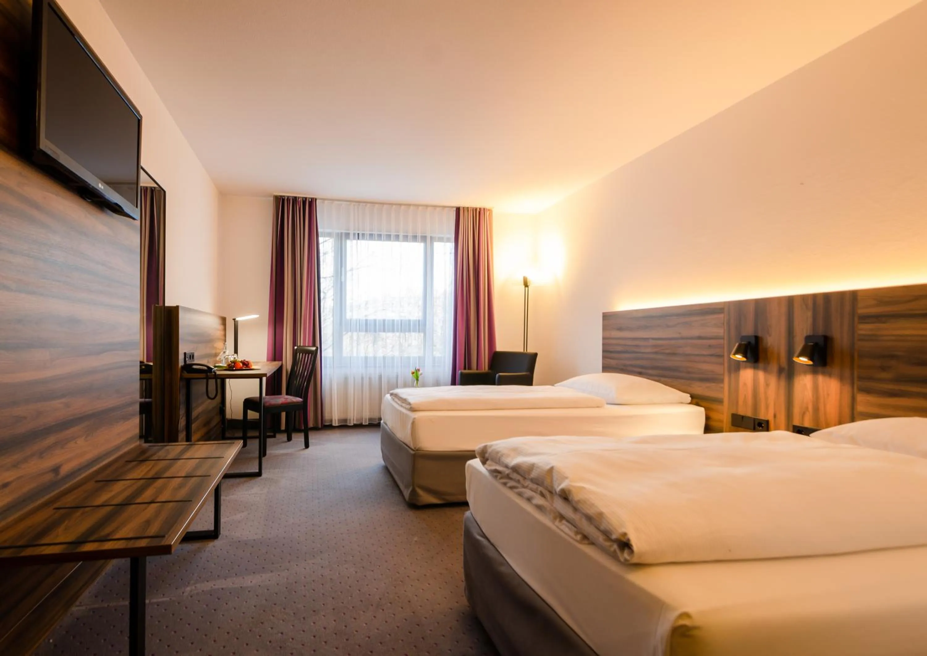 Photo of the whole room, Bed in City Hotel Fortuna Reutlingen