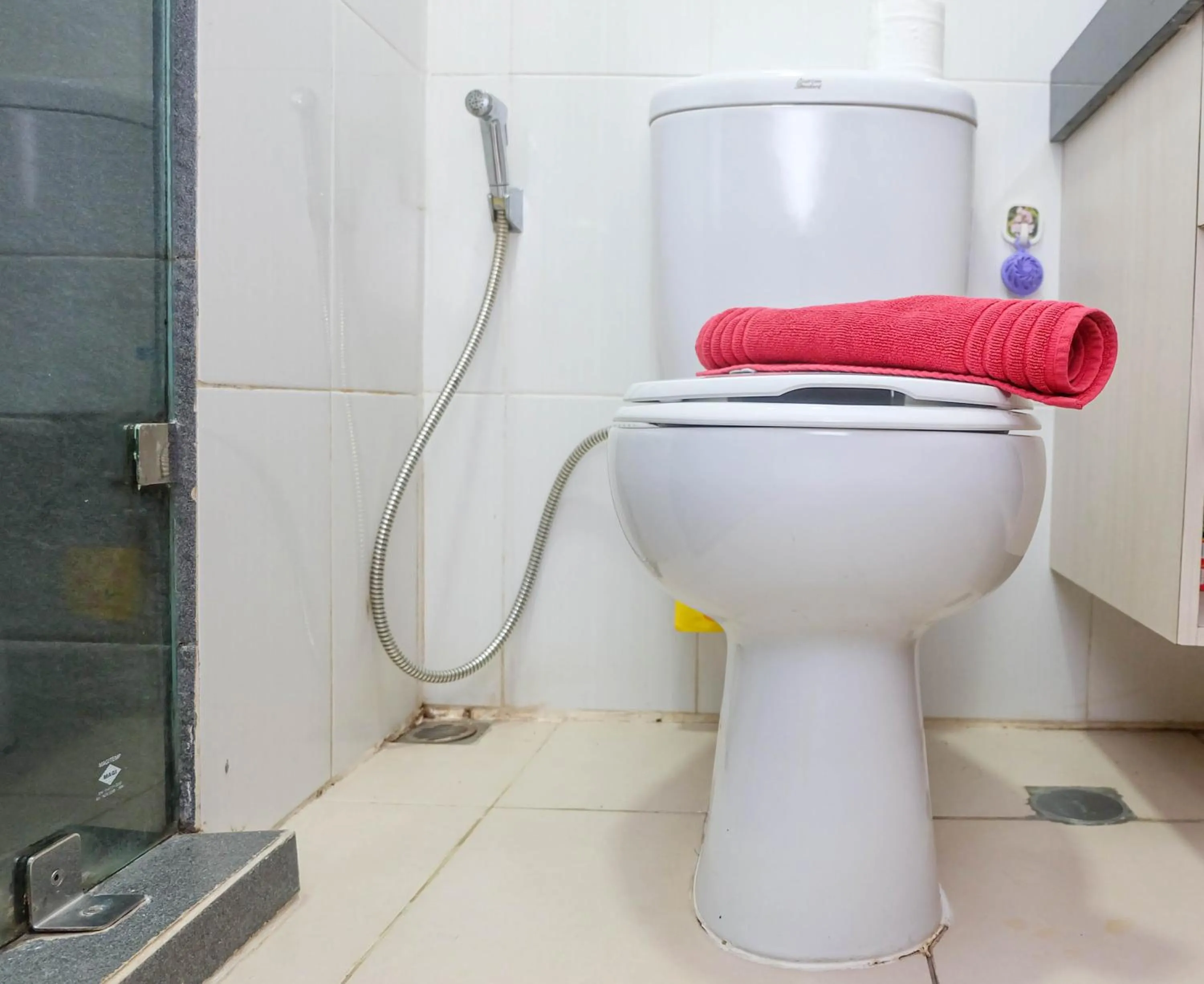 Bathroom in Good Location with Simply Furnished 1BR Apartment Woodland Park Residence By Travelio