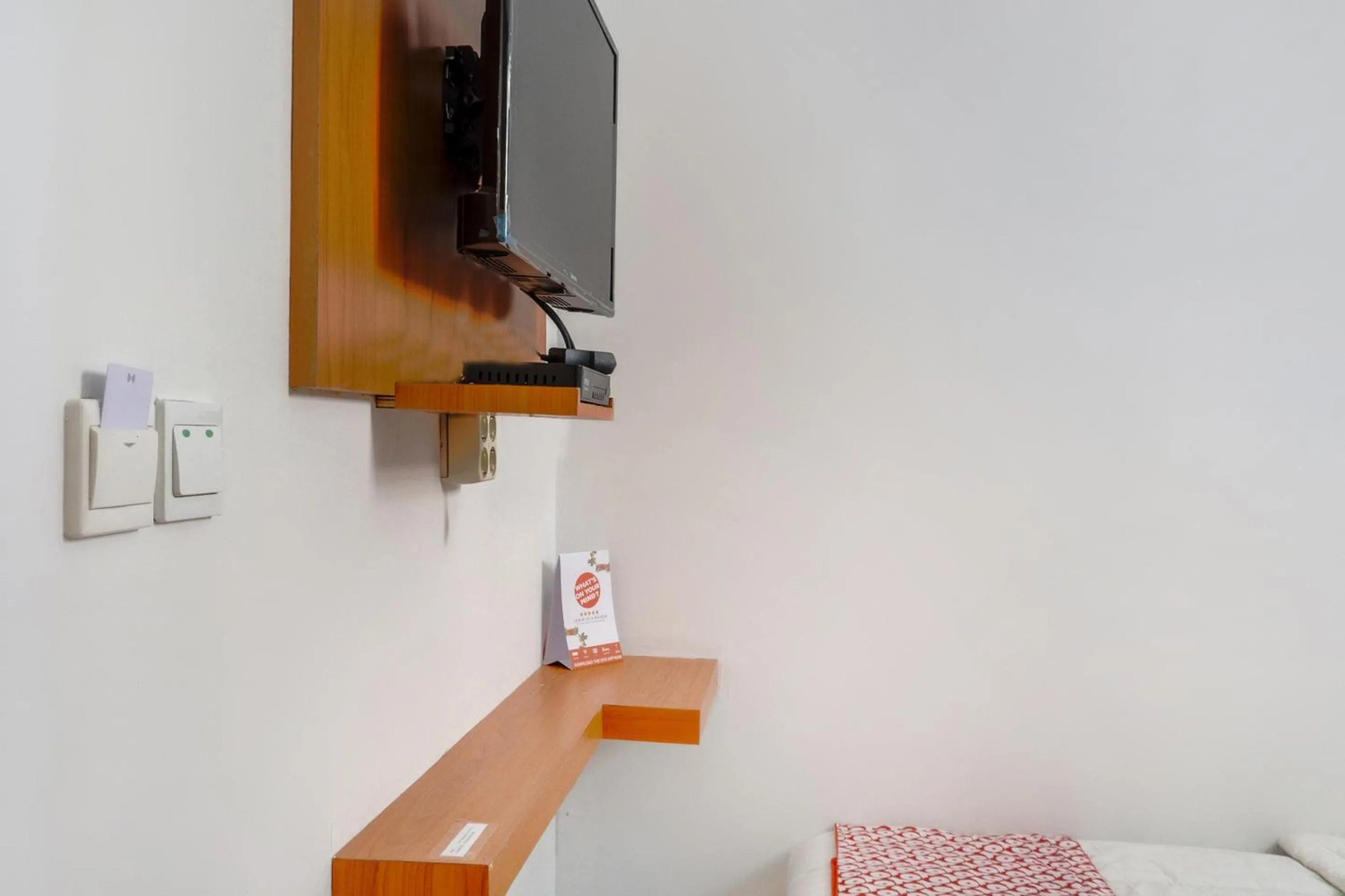 Bedroom in Hotel O Mandiri Guest House Syariah