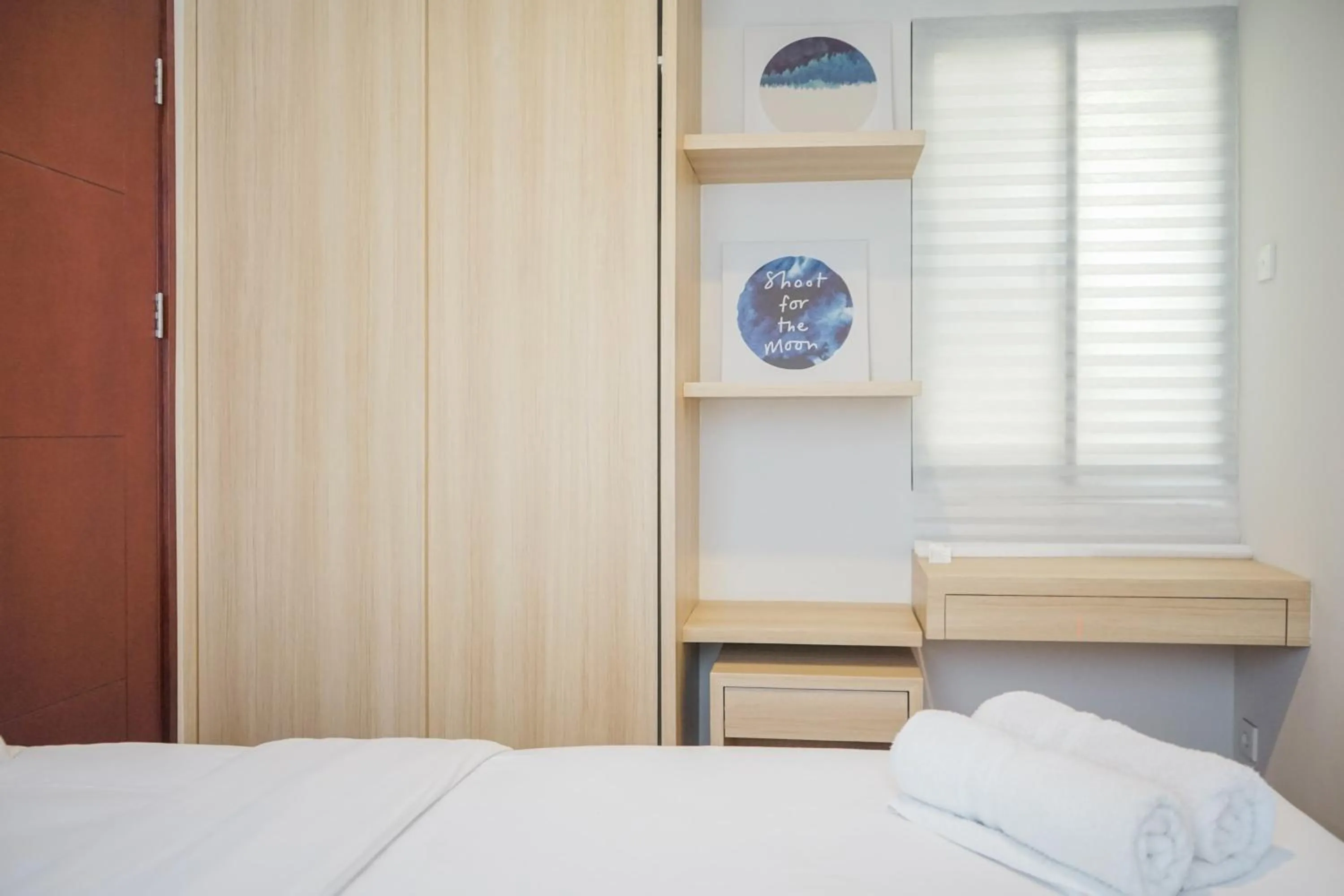 Bed in Cozy 1BR Asatti Apartment By Travelio
