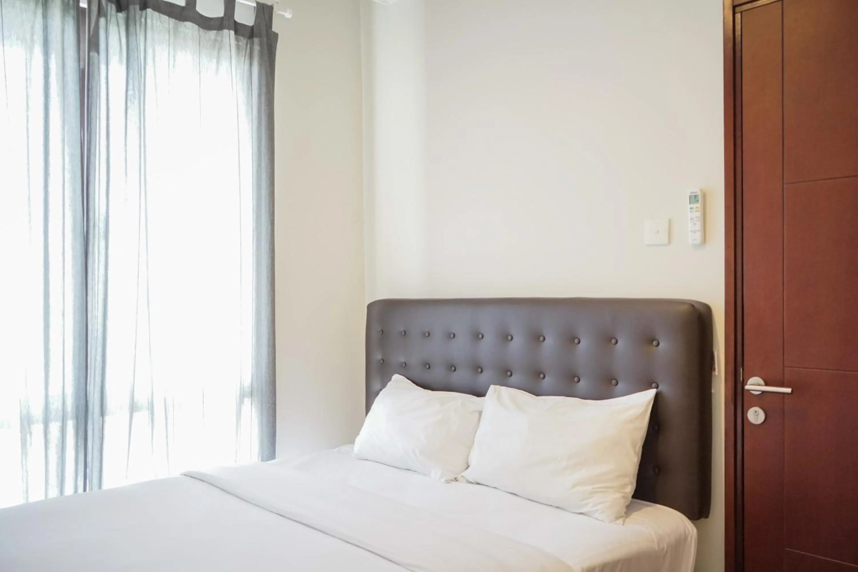Bedroom, Bed in Cozy 1BR Asatti Apartment By Travelio