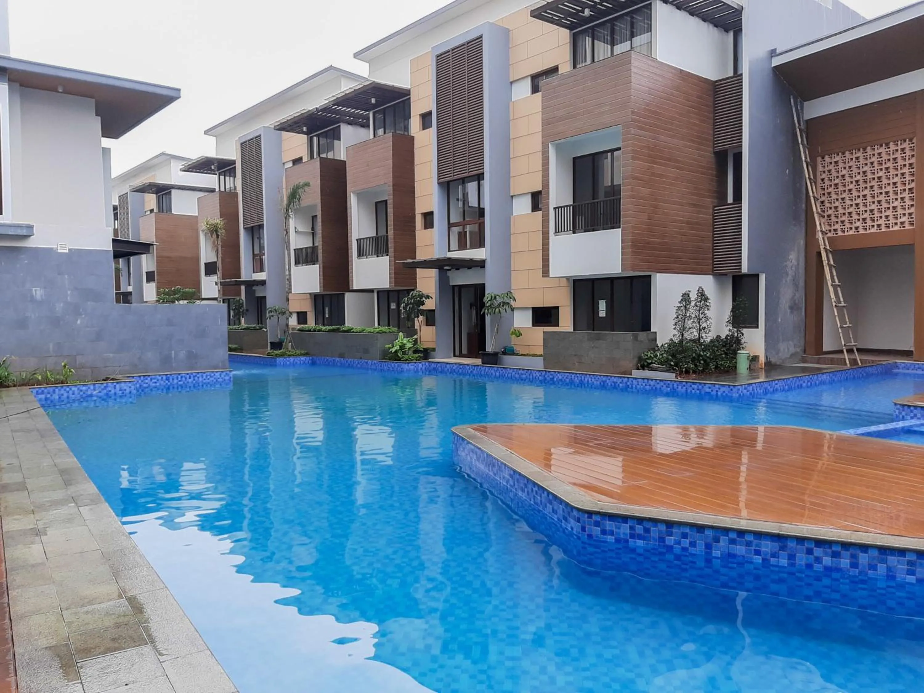 Swimming pool in Cozy 1BR Asatti Apartment By Travelio