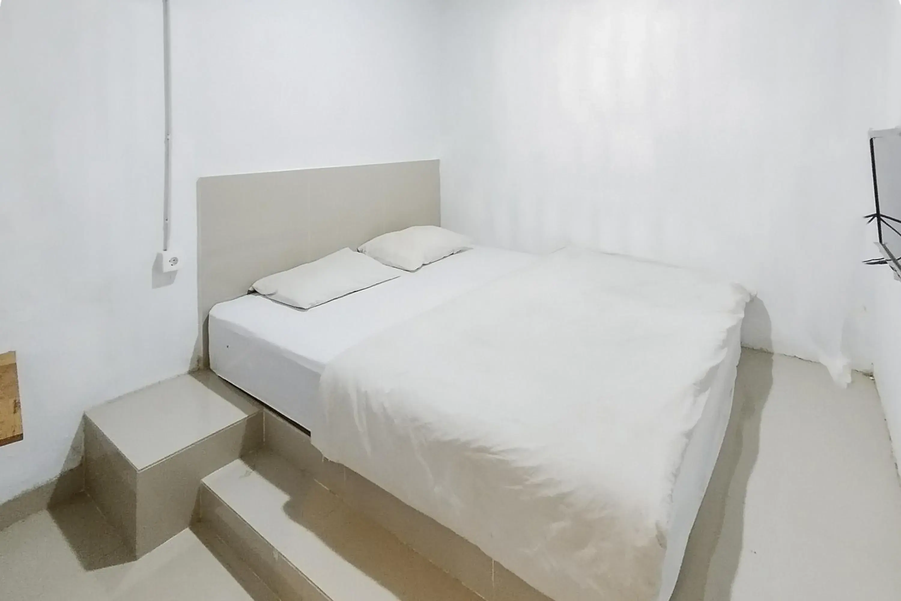 Bed in Alfalah Residence Syariah Mitra RedDoorz Bed in Alfalah Residence Syariah Mitra RedDoorz