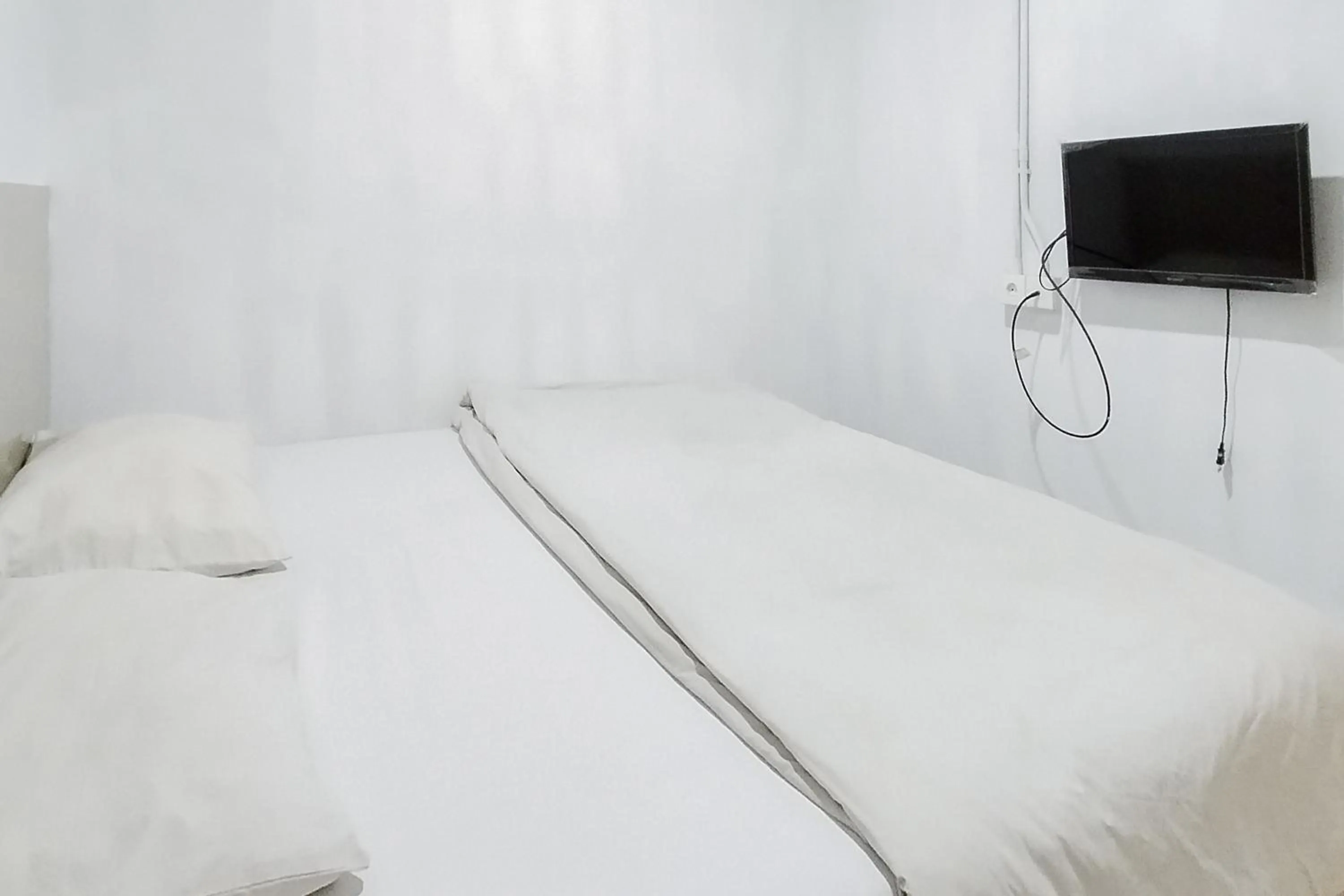 Bed in Alfalah Residence Syariah Mitra RedDoorz