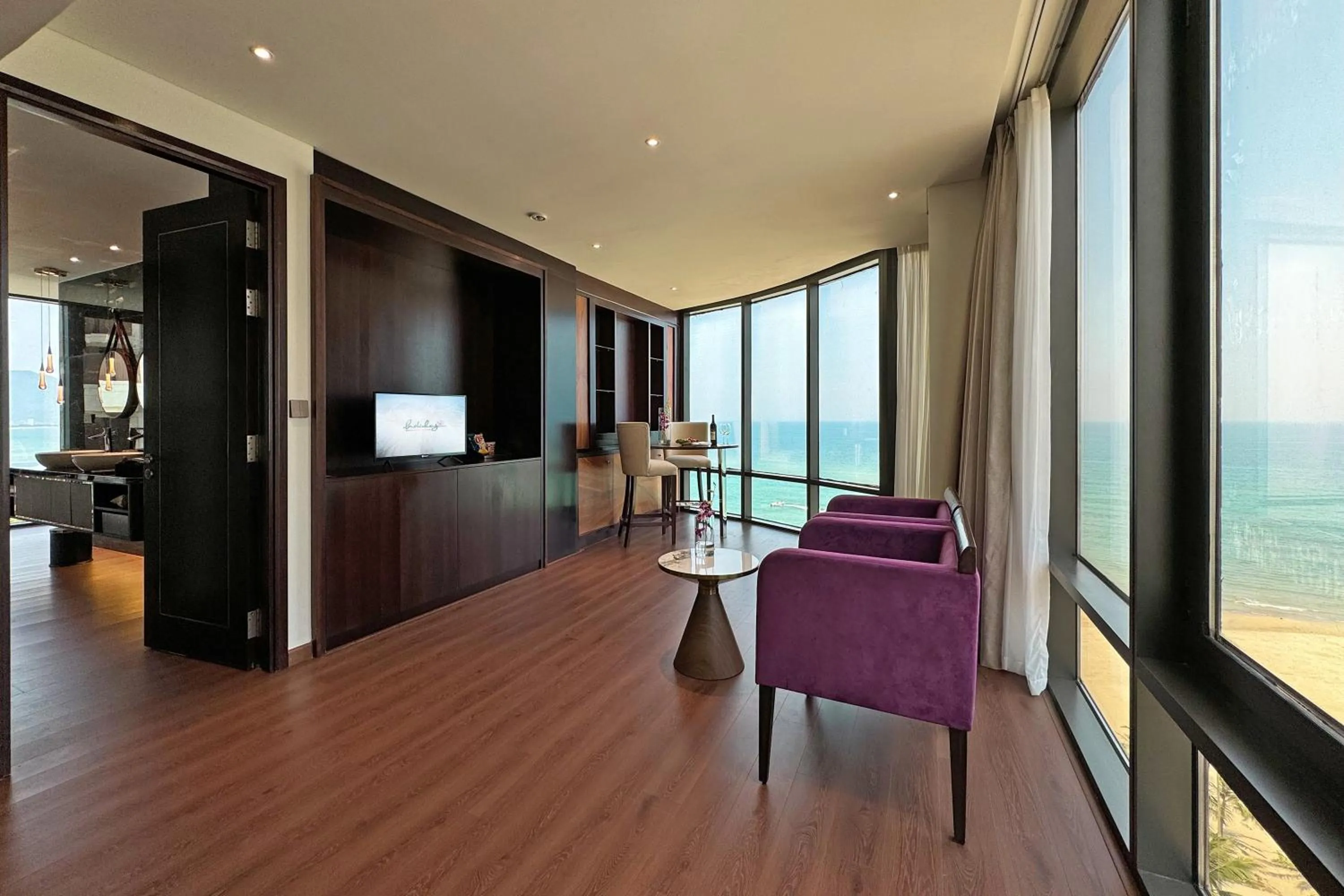 Communal lounge/ TV room in Holiday Beach Hotel Danang