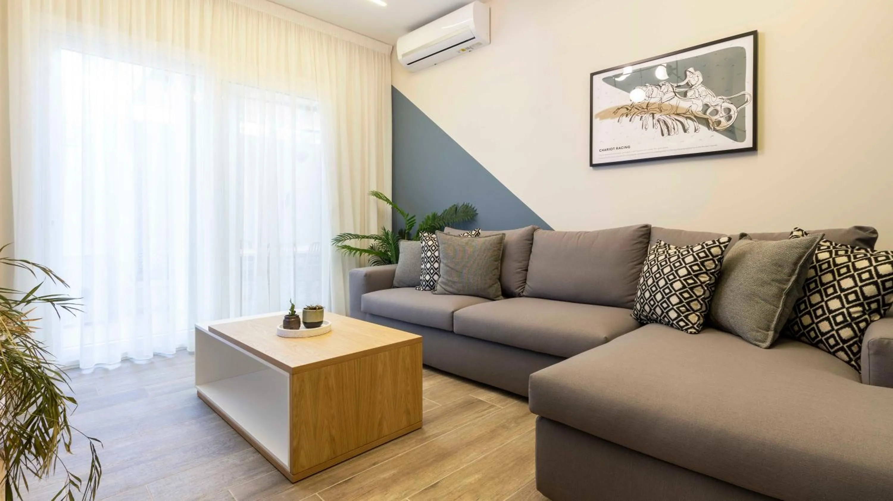 Living room in “Champions” Apartment in N. Kosmos neighbourhood