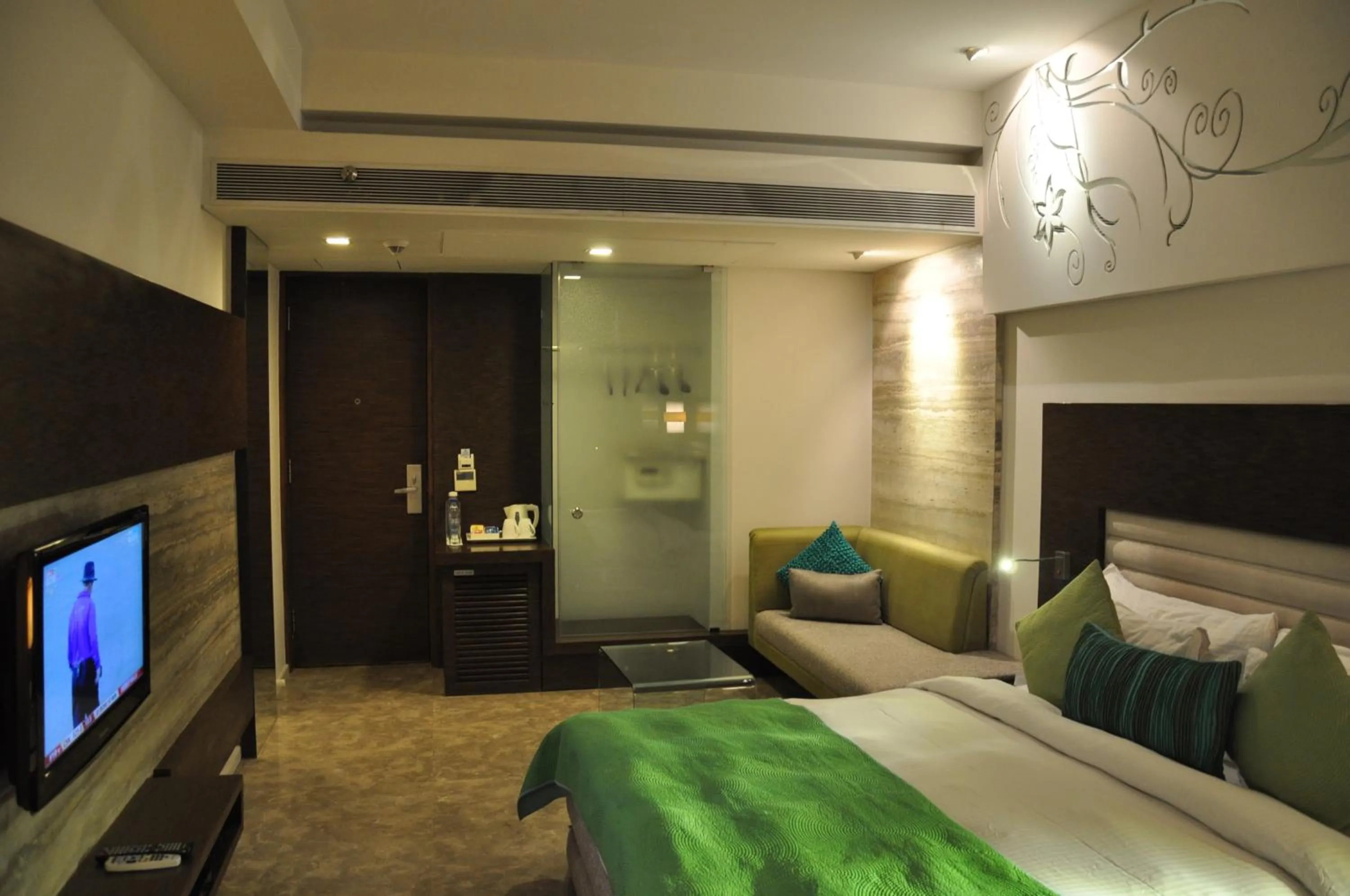 Living room, Bed in Maya Hotel