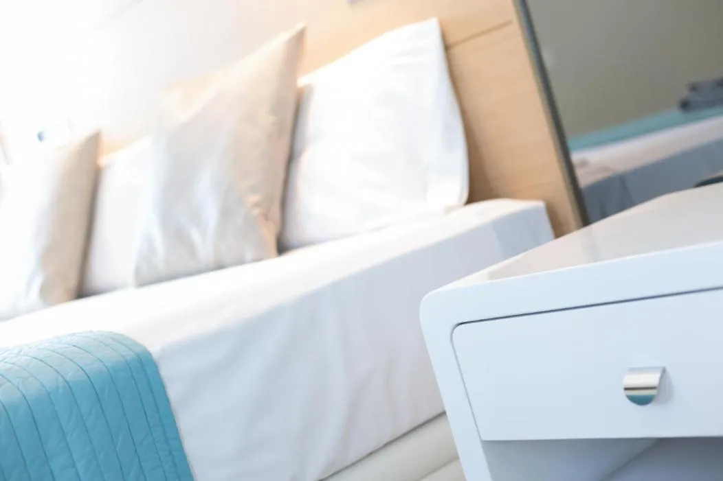 Bed in Kronos on the Beach Attic Suite