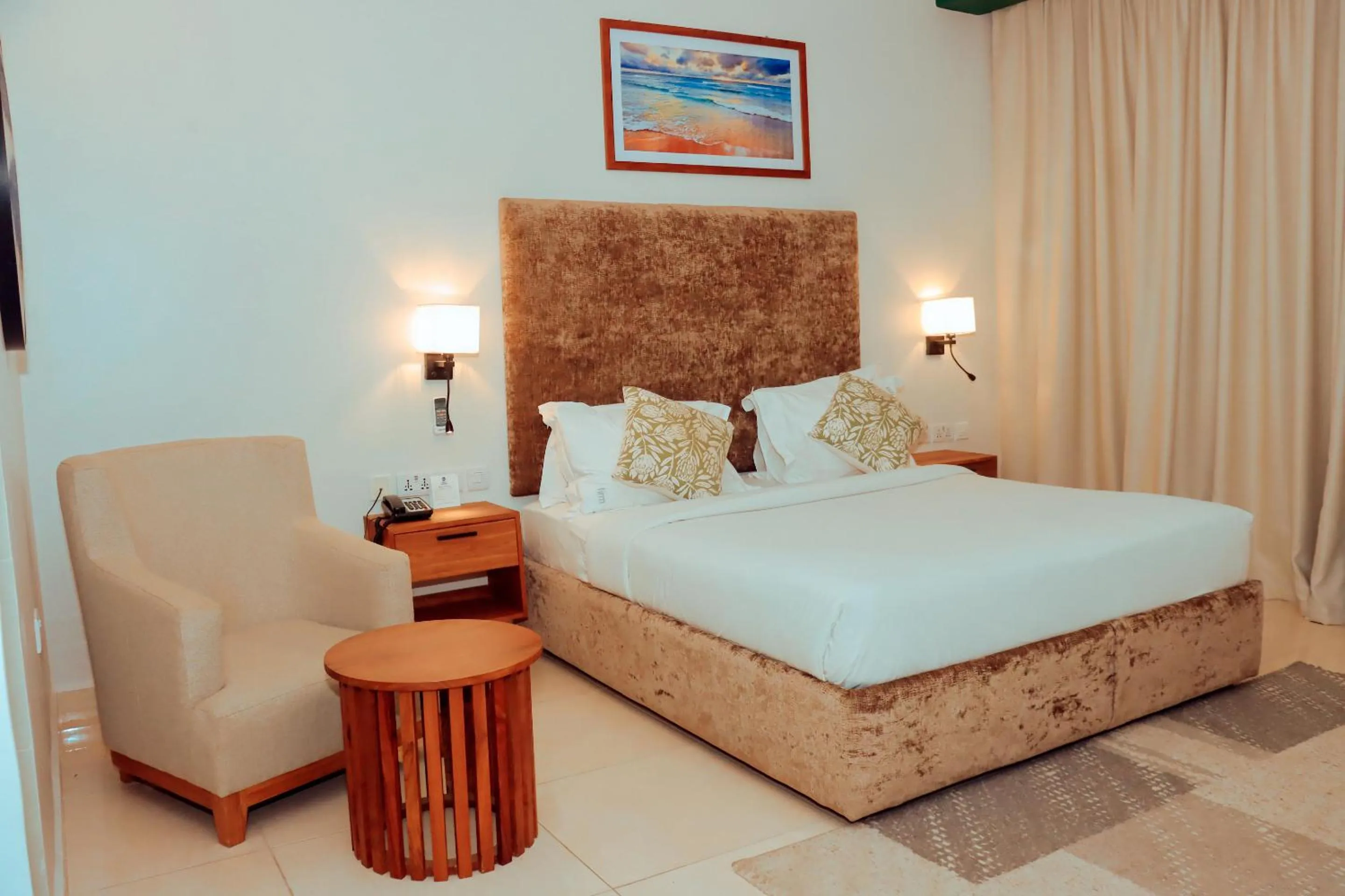 Bed in Best Western Jangwani Sea Breeze Resort
