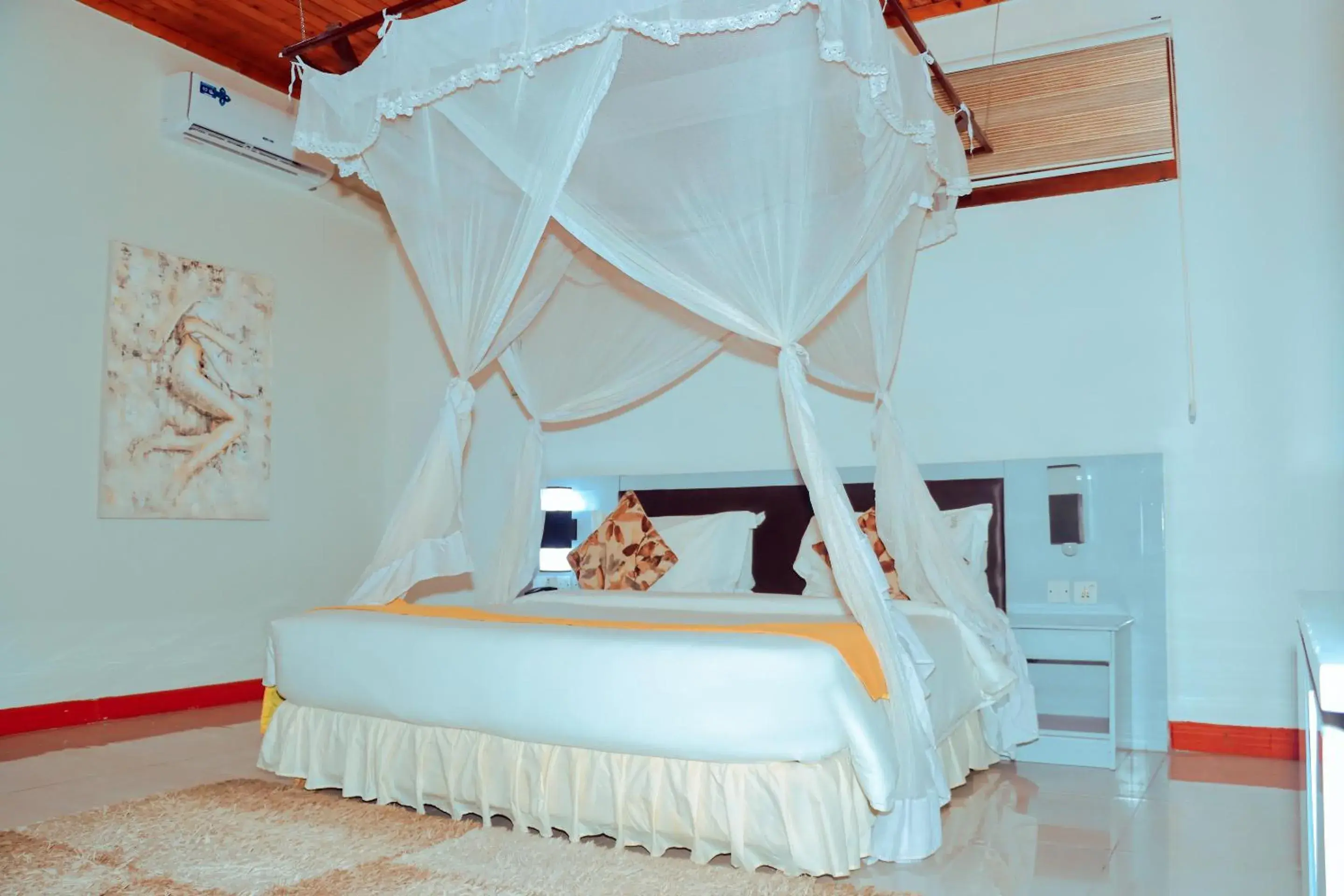 Bed in Best Western Jangwani Sea Breeze Resort Bed in Best Western Jangwani Sea Breeze Resort