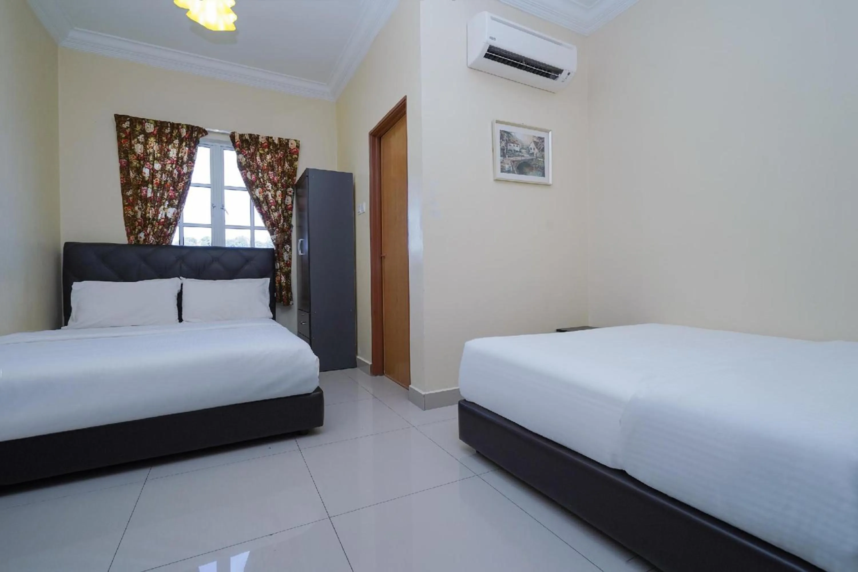 Photo of the whole room, Bed in Hotel O Bangi Sri Minang Guesthouse