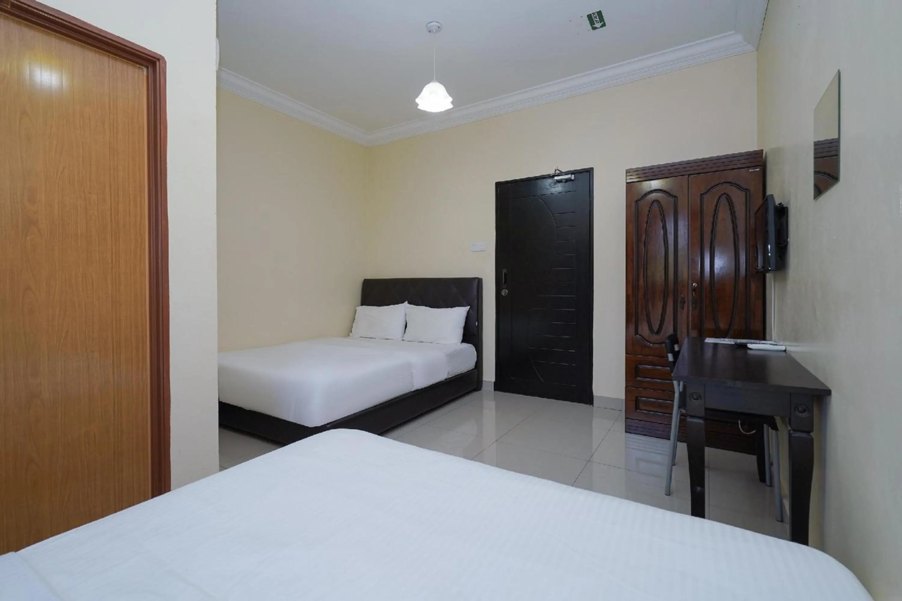 Photo of the whole room, Bed in Hotel O Bangi Sri Minang Guesthouse