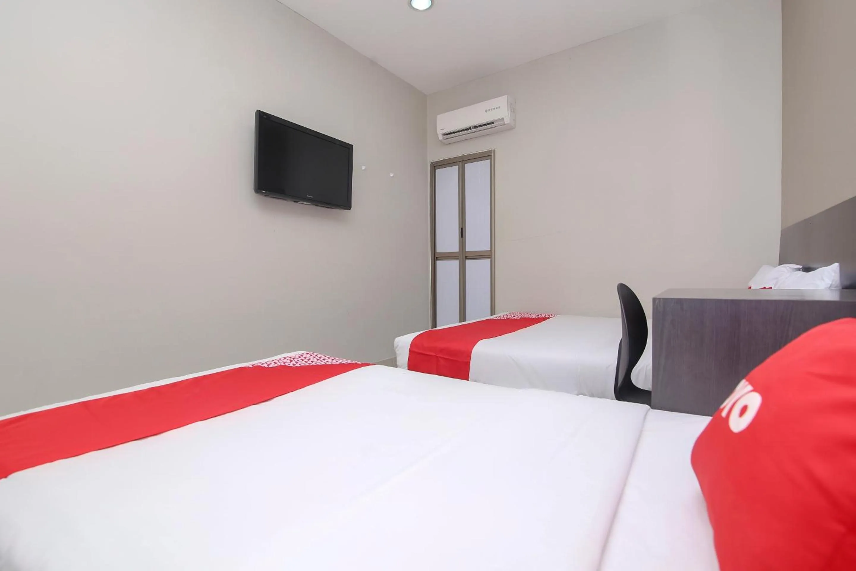 Bedroom, Bed in Hotel O Nice Stay Three Six Five Services