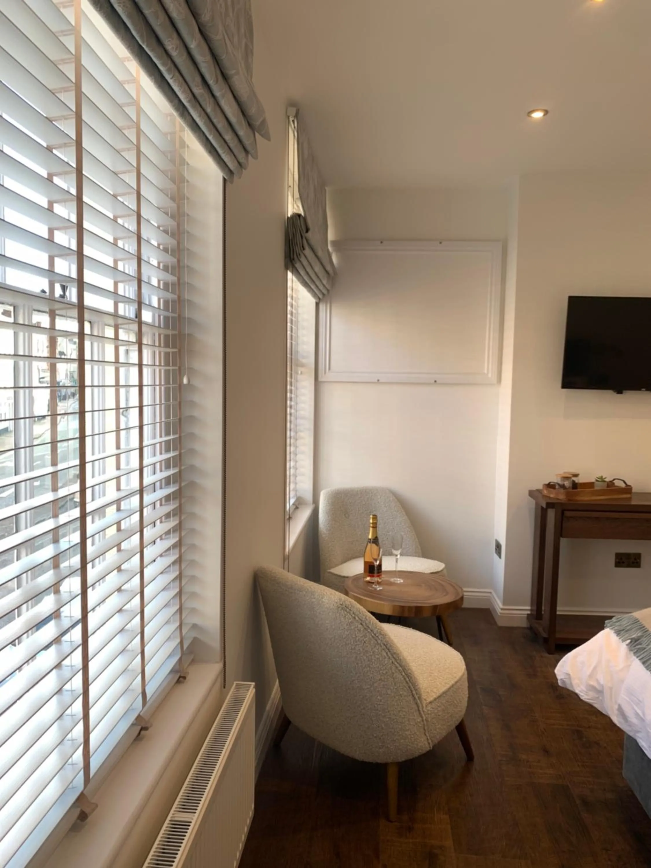 Seating area, Bed in Upstairs at 33 - Self check in boutique accommodation in Worcester Centre