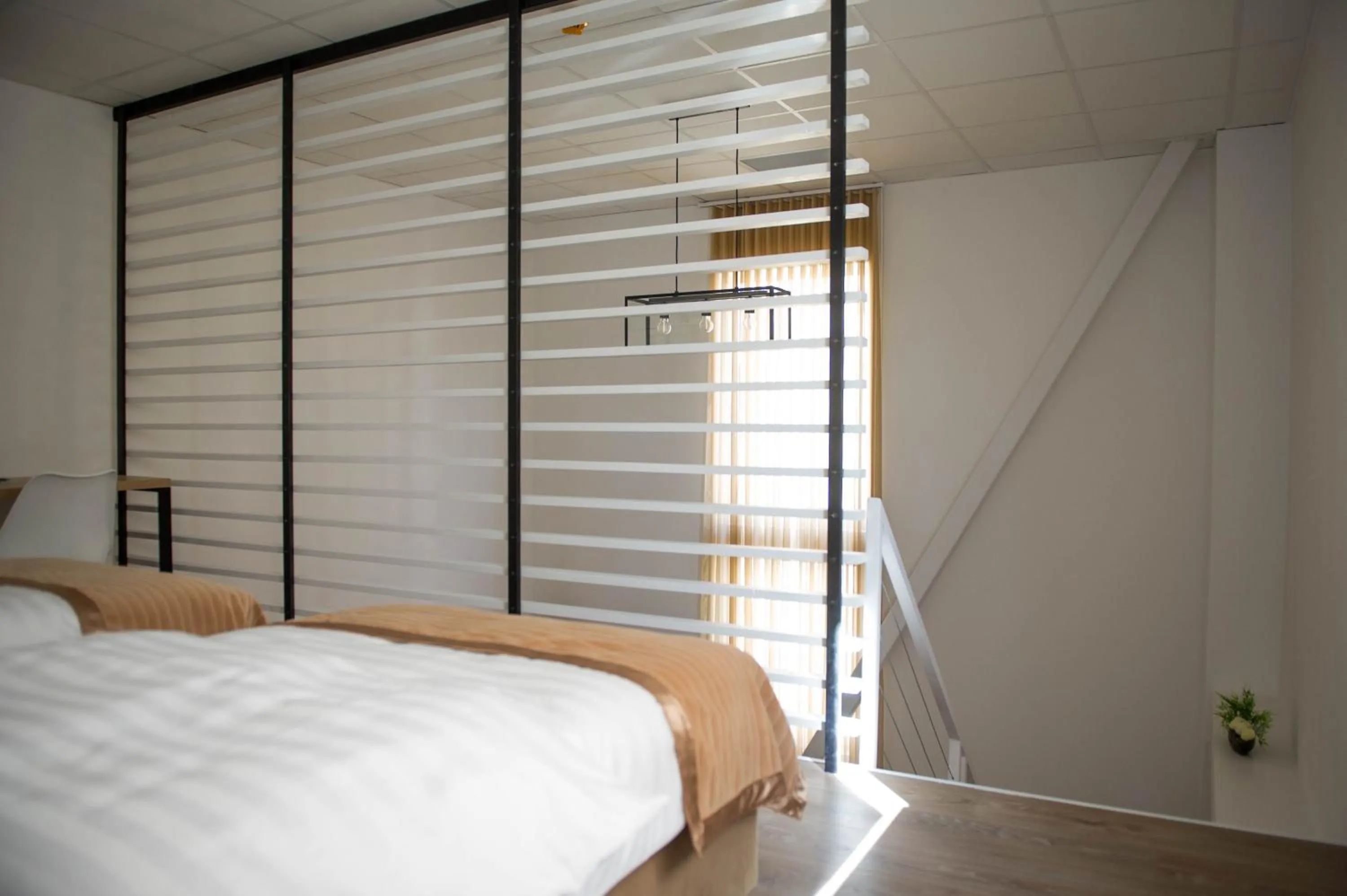 Bed in FRIENDS RESIDENCE Apartments